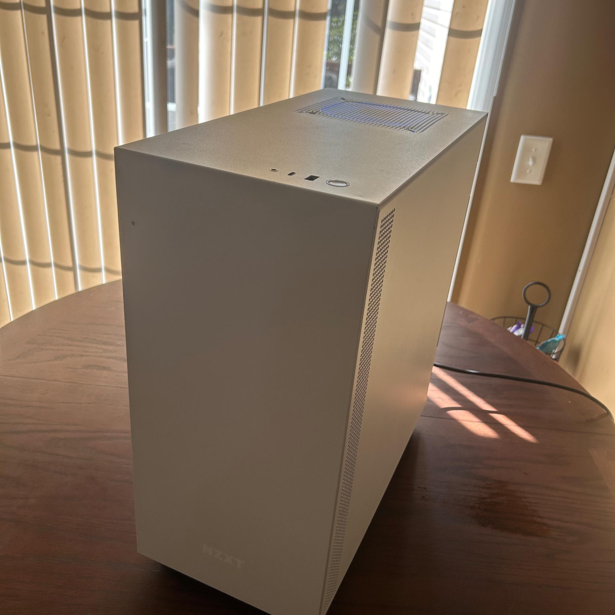 4060ti+12600k, 32GB Ram, 1TB NVME Ssd, vertical mounted, all white NZXT build.