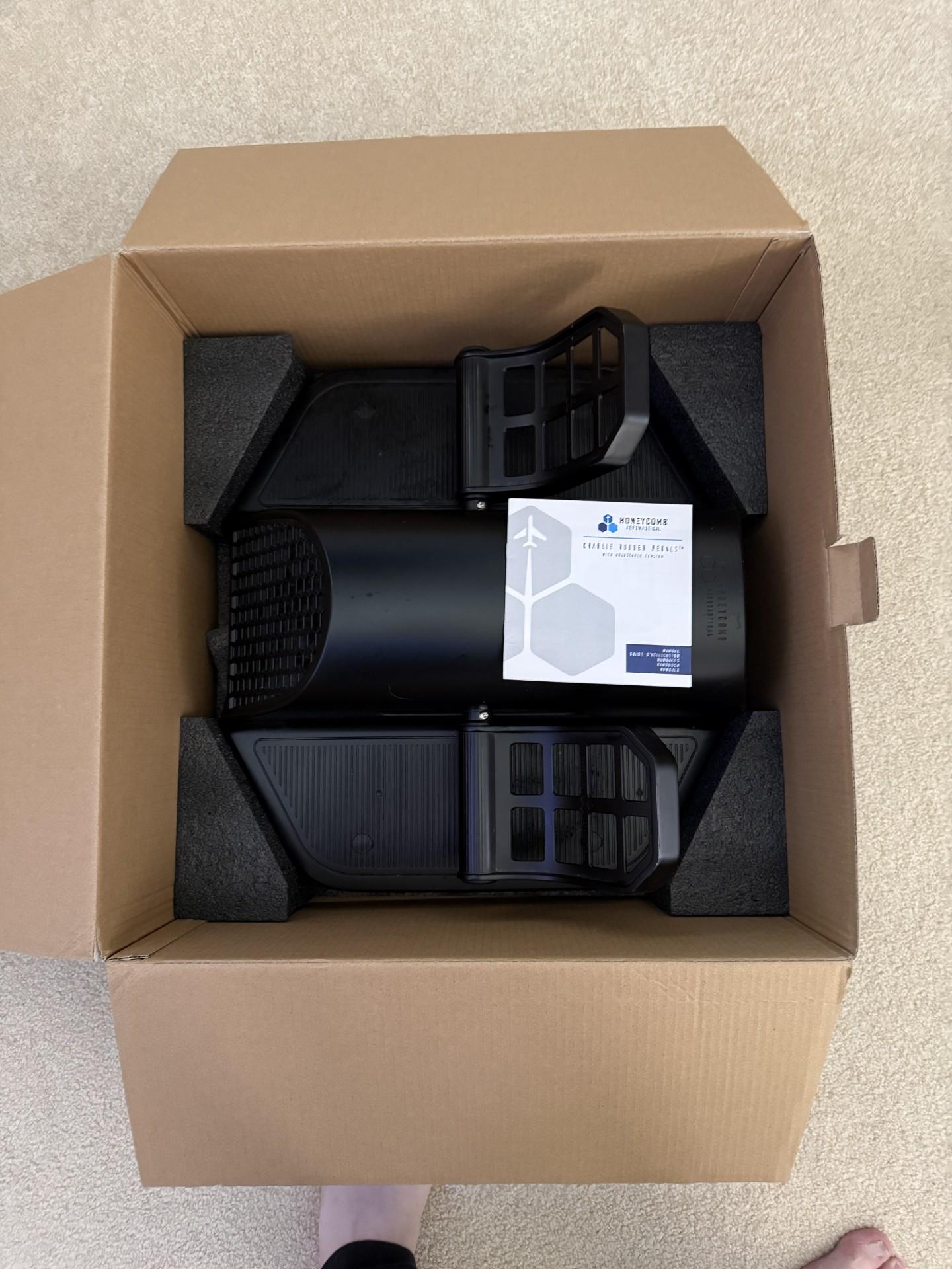 Excellent Condition Honeycomb Charlie Rudder Pedals with Original Box, Manual, and Dust Cover