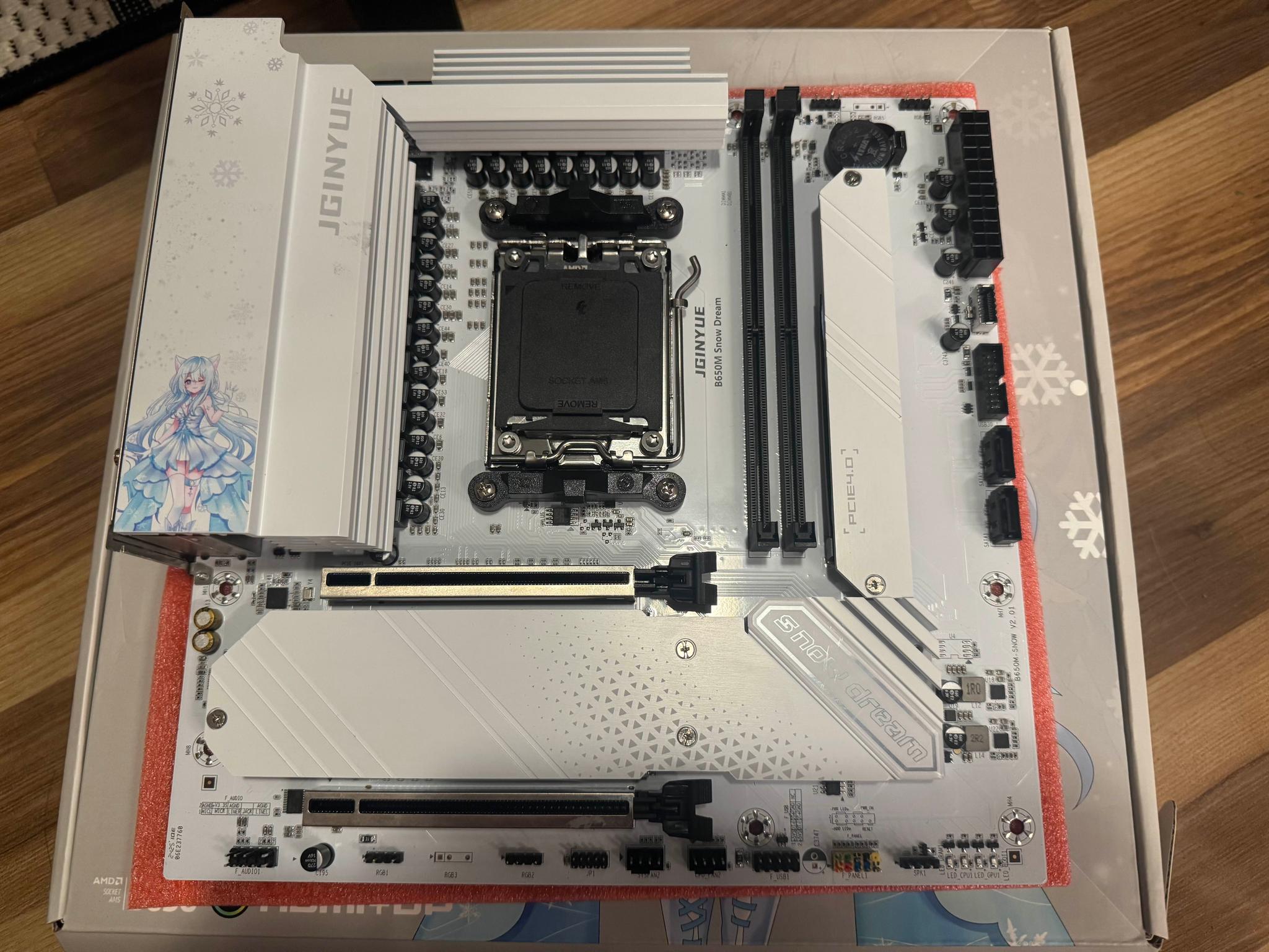 JGINYUE B650M Snow Dream motherboard + WiFi/Bluetooth installed
