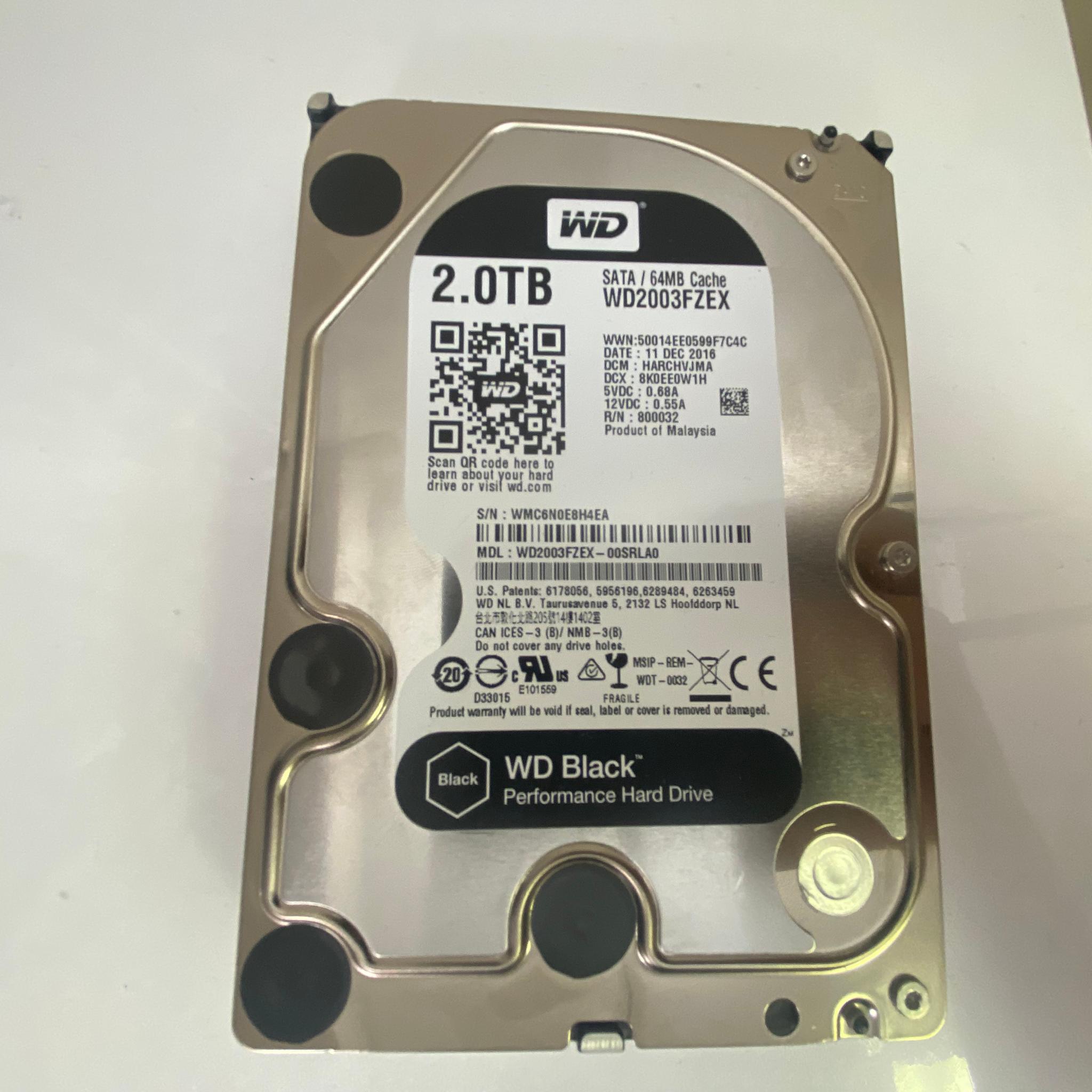WD 2TB Hard Drive (HDD) – Fully Reset, Tested, Good Condition