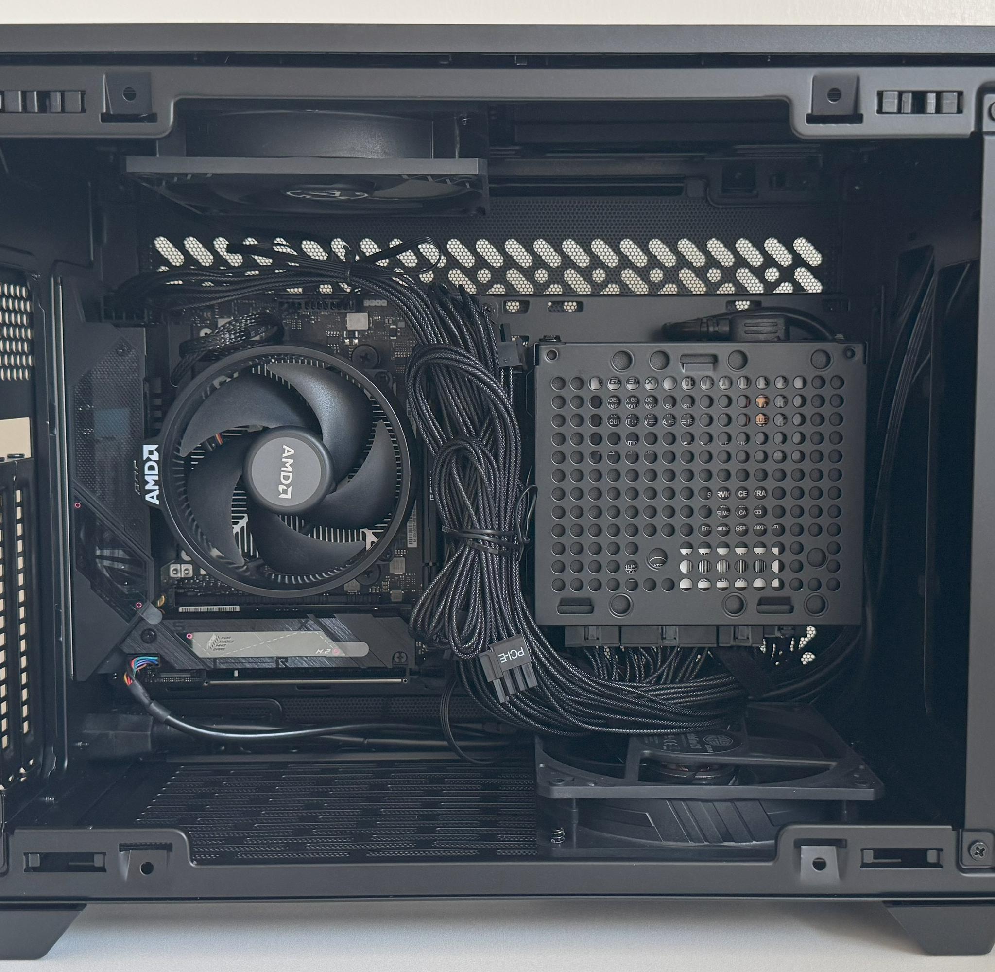 AM5 Mini ITX PC AMD Ryzen 5 8600G ASUS ROG STRIX B650E-I 1TB SSD 32GB DDR5 Cooler Master NR200P V2