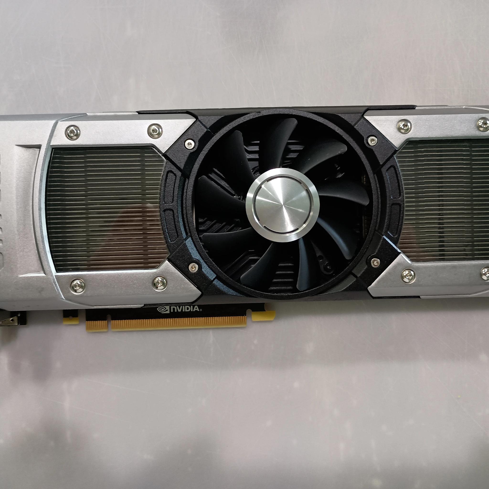 Two GTX 690 GPUs for Quad SLI (with SLI bridge). Tested, works well.