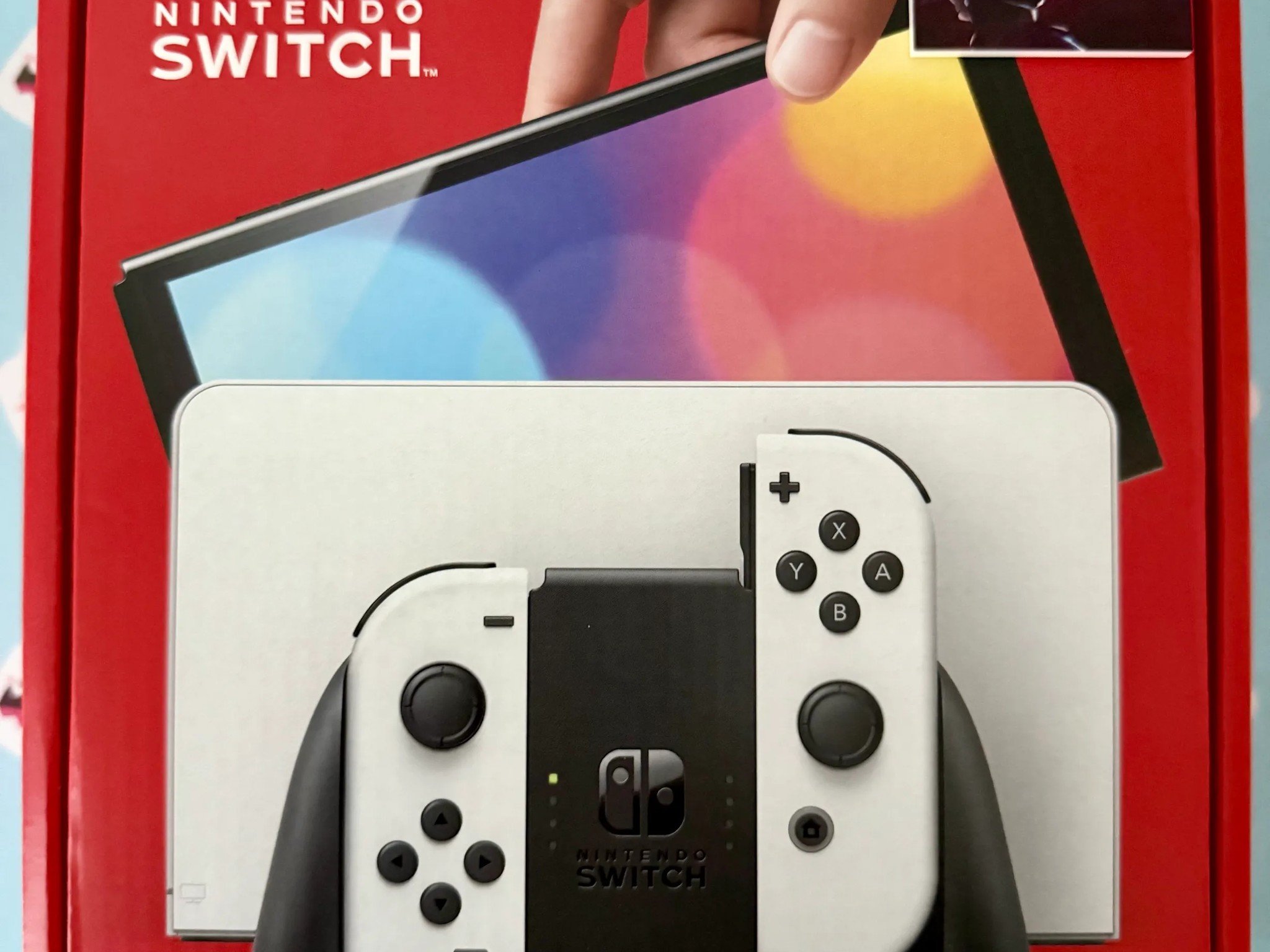 Nintendo Switch – OLED Model w/ White Joy-Con