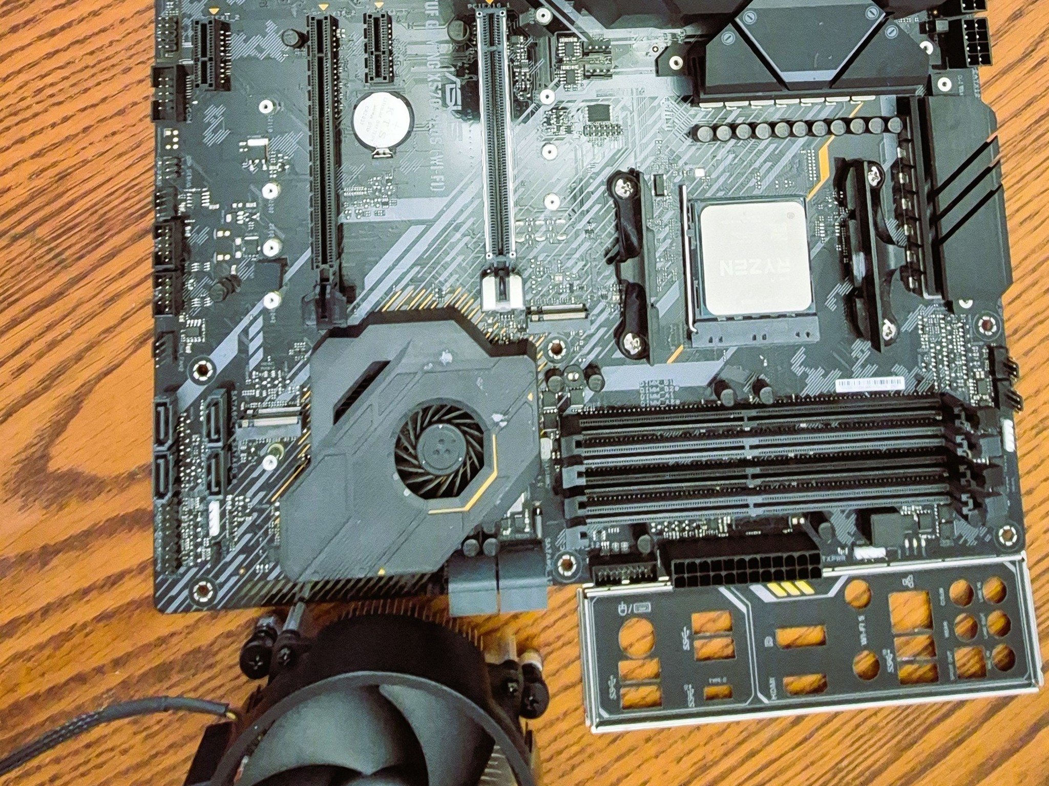 Pre-owned AMD Ryzen 9 5950X CPU, ASUS TUF Gaming X570 Plus (WI-FI) AXT M-board  and AMD Wrath Cooler