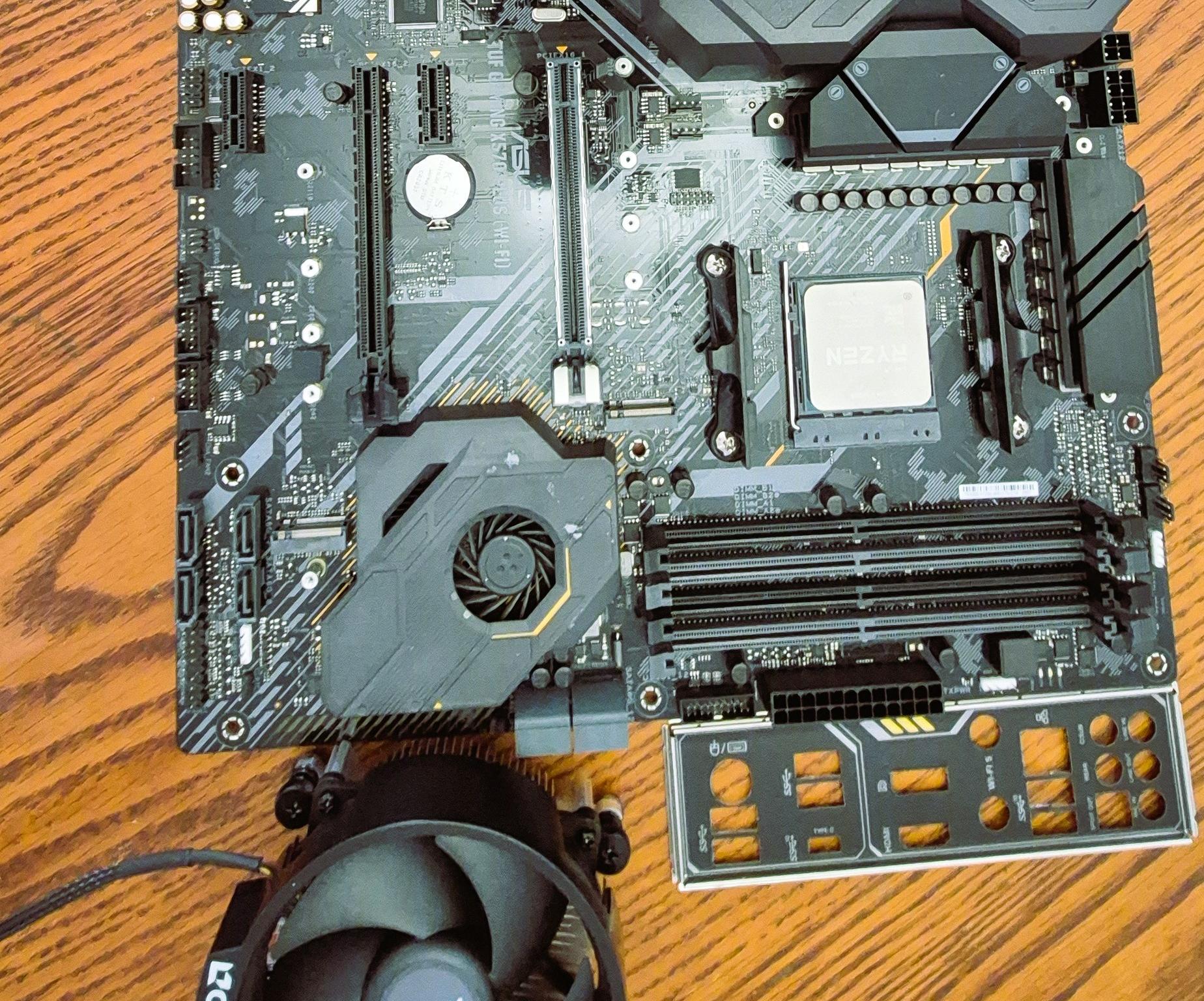 Pre-owned AMD Ryzen 9 5950X CPU, ASUS TUF Gaming X570 Plus (WI-FI) AXT M-board  and AMD Wrath Cooler
