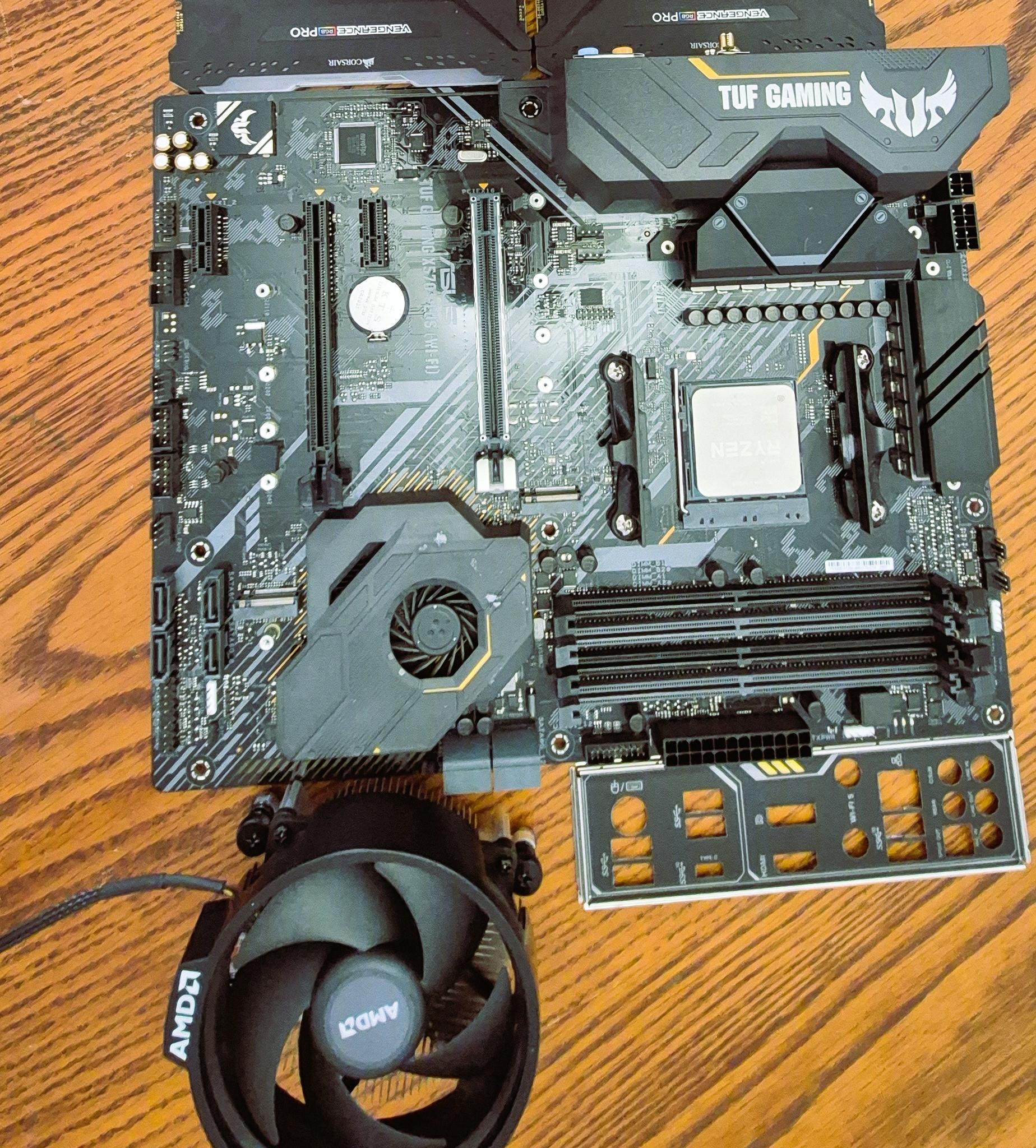 Pre-owned AMD Ryzen 9 5950X CPU, ASUS TUF Gaming X570 Plus (WI-FI) AXT M-board  and AMD Wrath Cooler