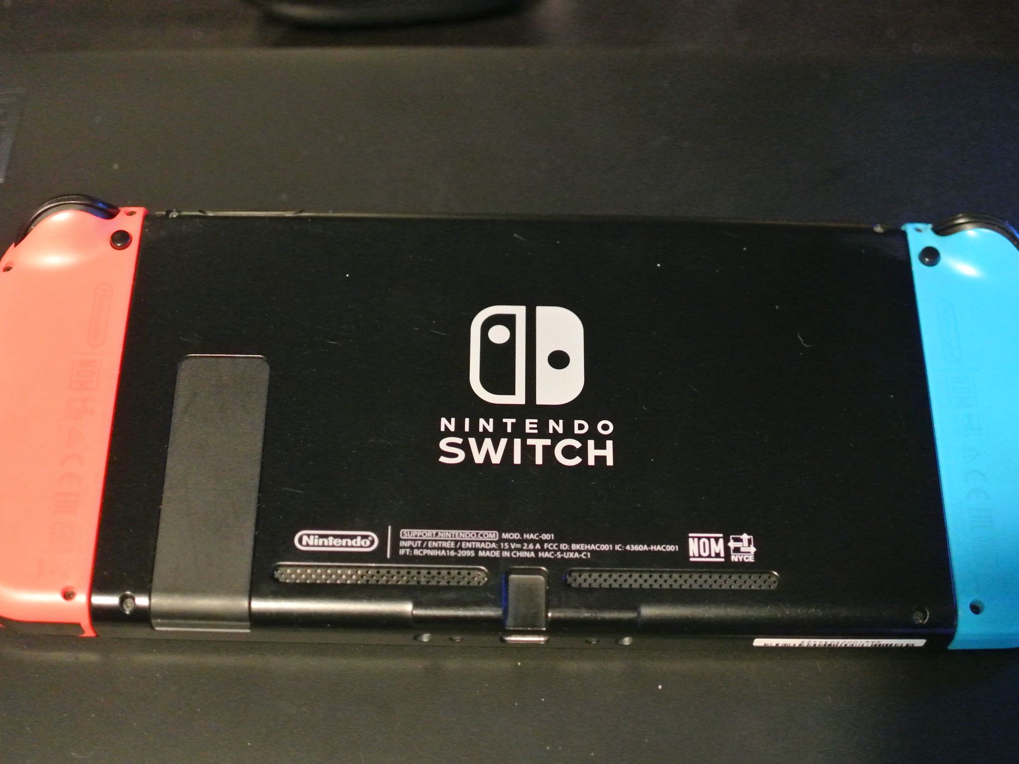 Nintendo Switch w/ Dock, Joycons, Grip and Travel Case