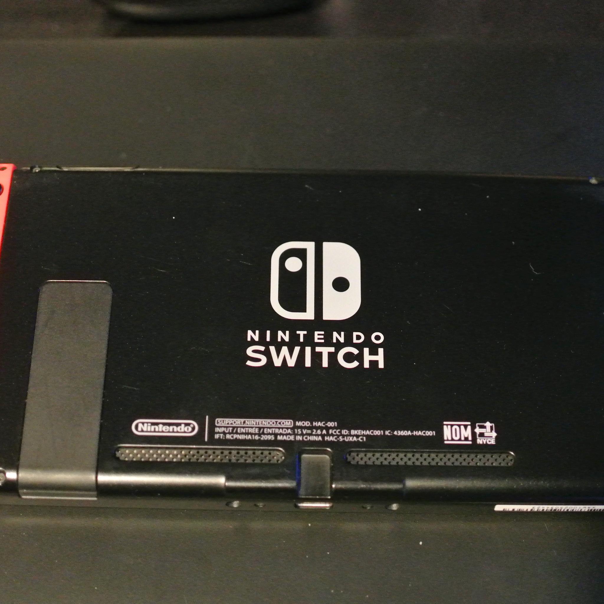Nintendo Switch w/ Dock, Joycons, Grip and Travel Case