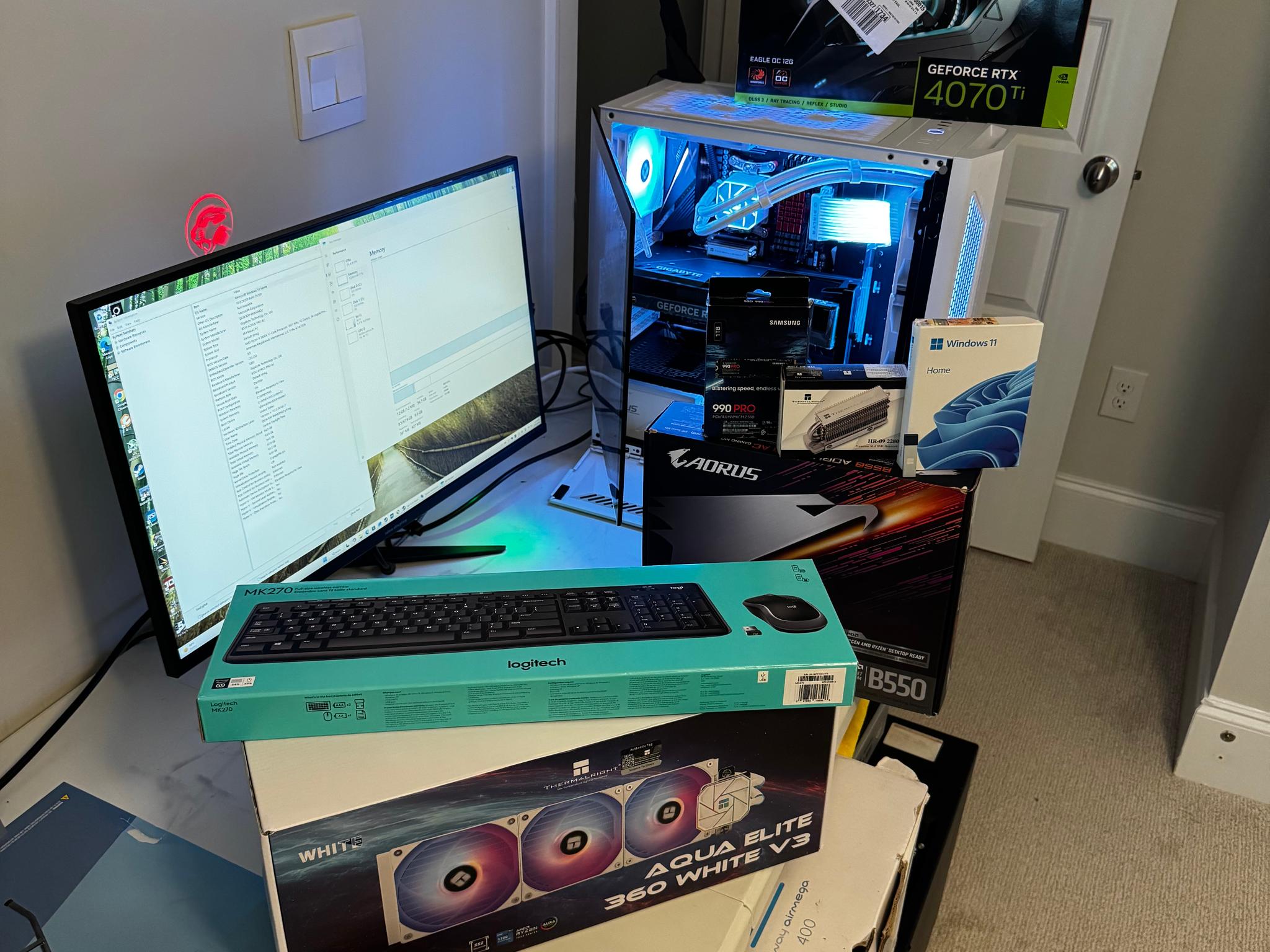AMD AM4 new build Whiteout RTX 4070 Ti Gaming PC Build (12-Core Ryzen) + 2K and 1080p Monitors
