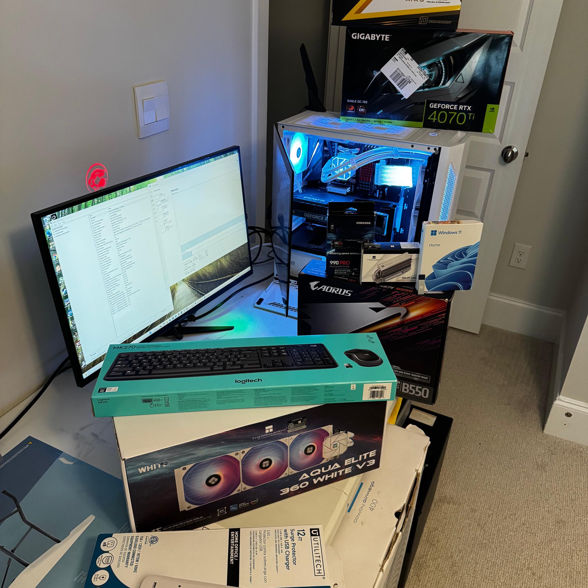 AMD AM4 new build Whiteout RTX 4070 Ti Gaming PC Build (12-Core Ryzen) + 2K and 1080p Monitors