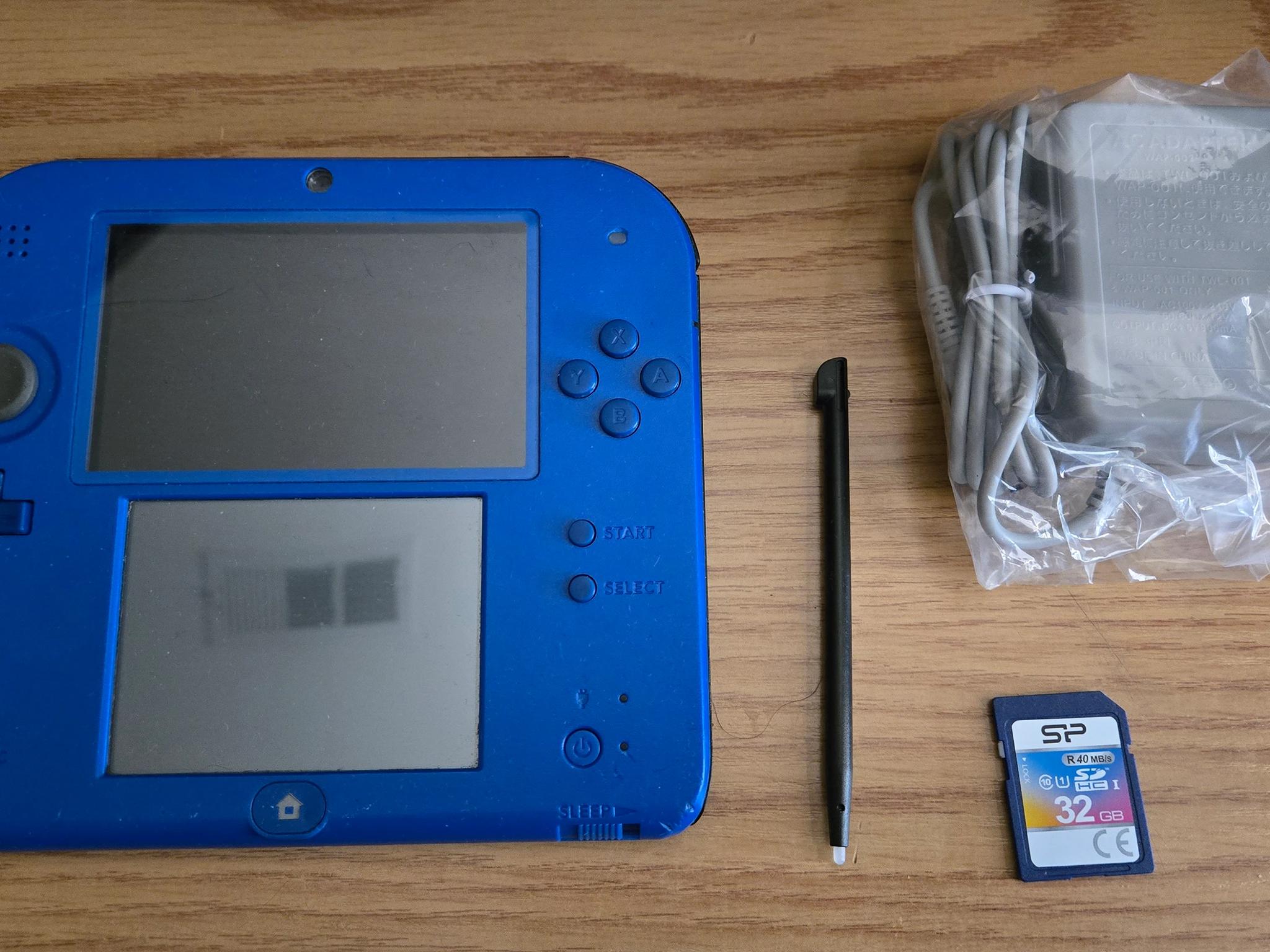 CUSTOM RENEWED Nintendo 2DS Blue/Black Handheld Console w/Multiple Games
