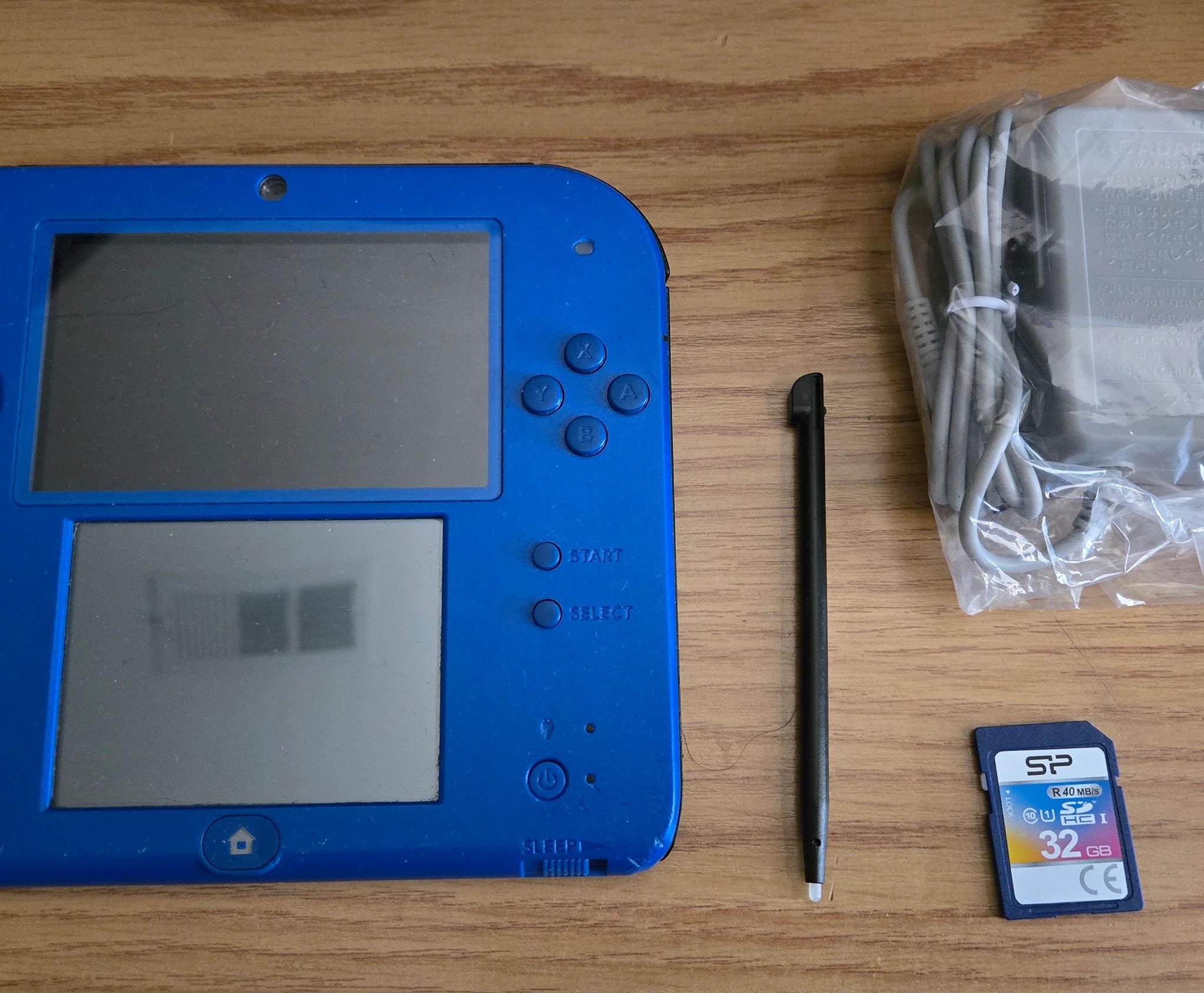 CUSTOM RENEWED Nintendo 2DS Blue/Black Handheld Console w/Multiple Games