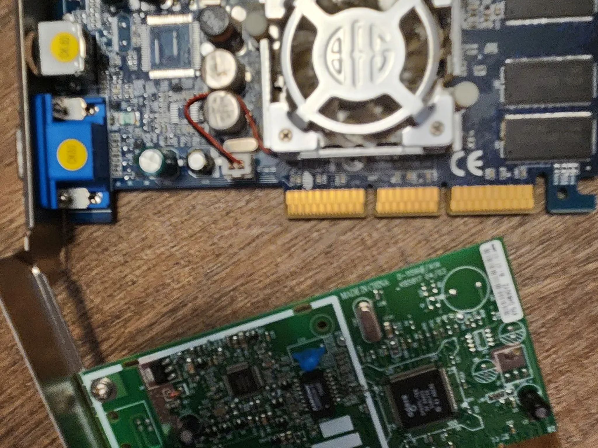 Prehistoric amd athlon 64 asus motherboard ram combo with a nvidia fx 5500 and a miscellaneous card