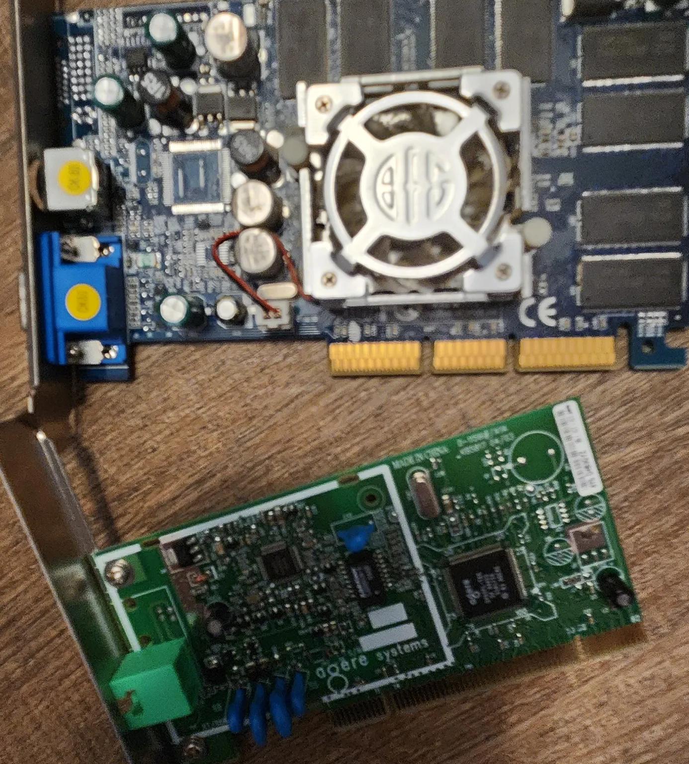 Prehistoric amd athlon 64 asus motherboard ram combo with a nvidia fx 5500 and a miscellaneous card