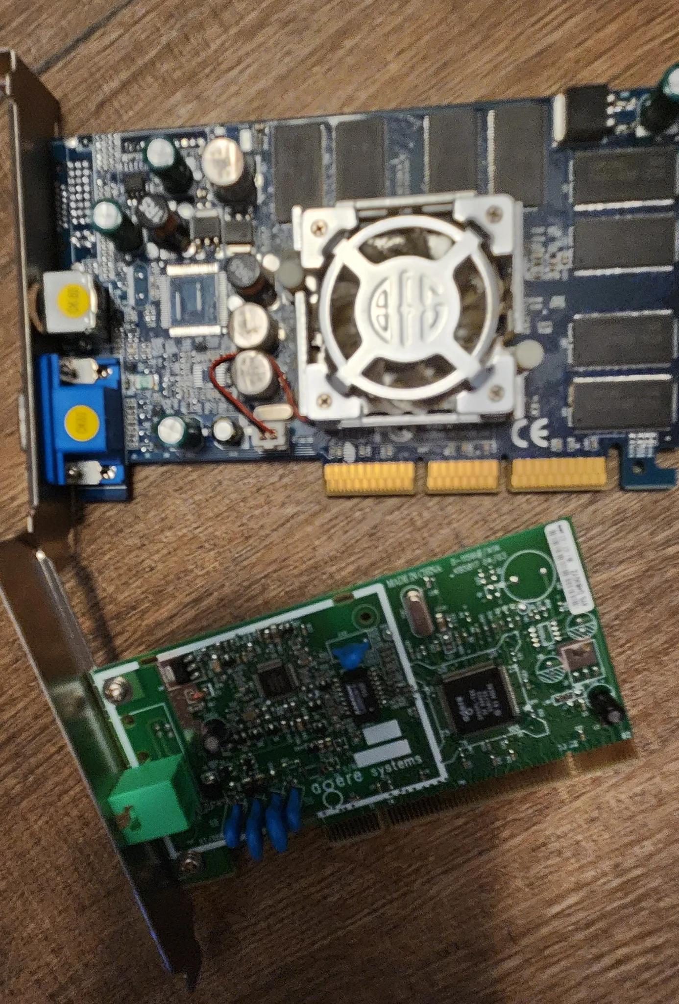 Prehistoric amd athlon 64 asus motherboard ram combo with a nvidia fx 5500 and a miscellaneous card