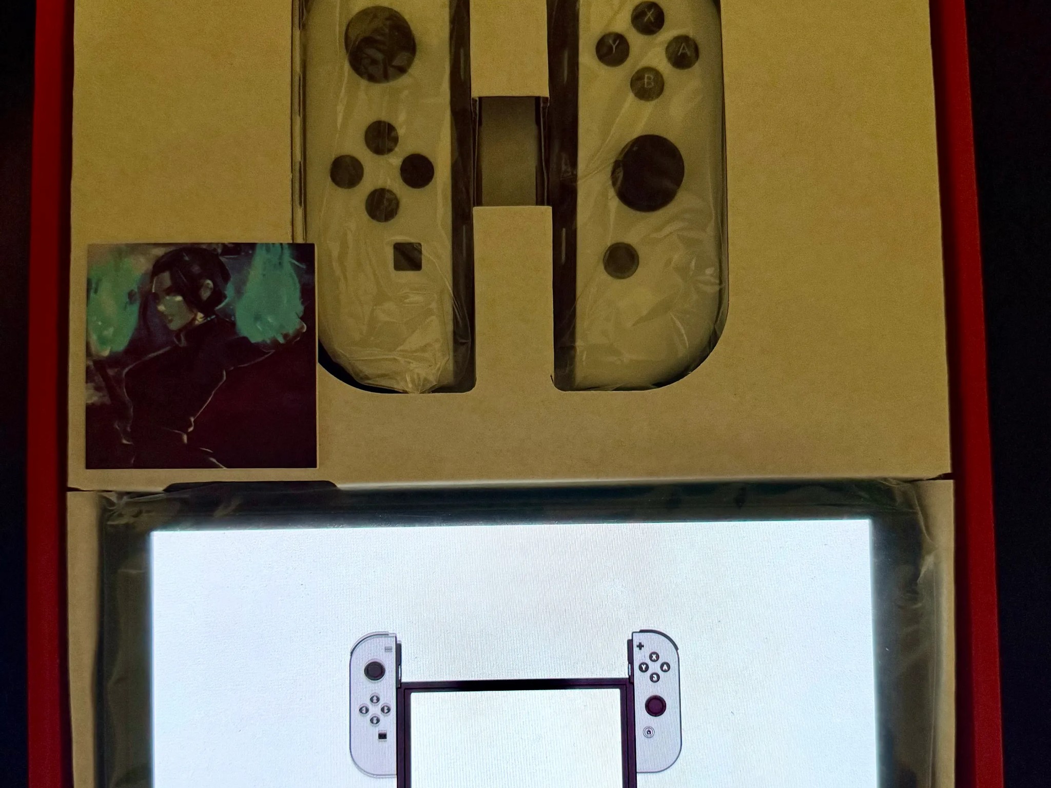 Nintendo Switch – OLED Model w/ White Joy-Con