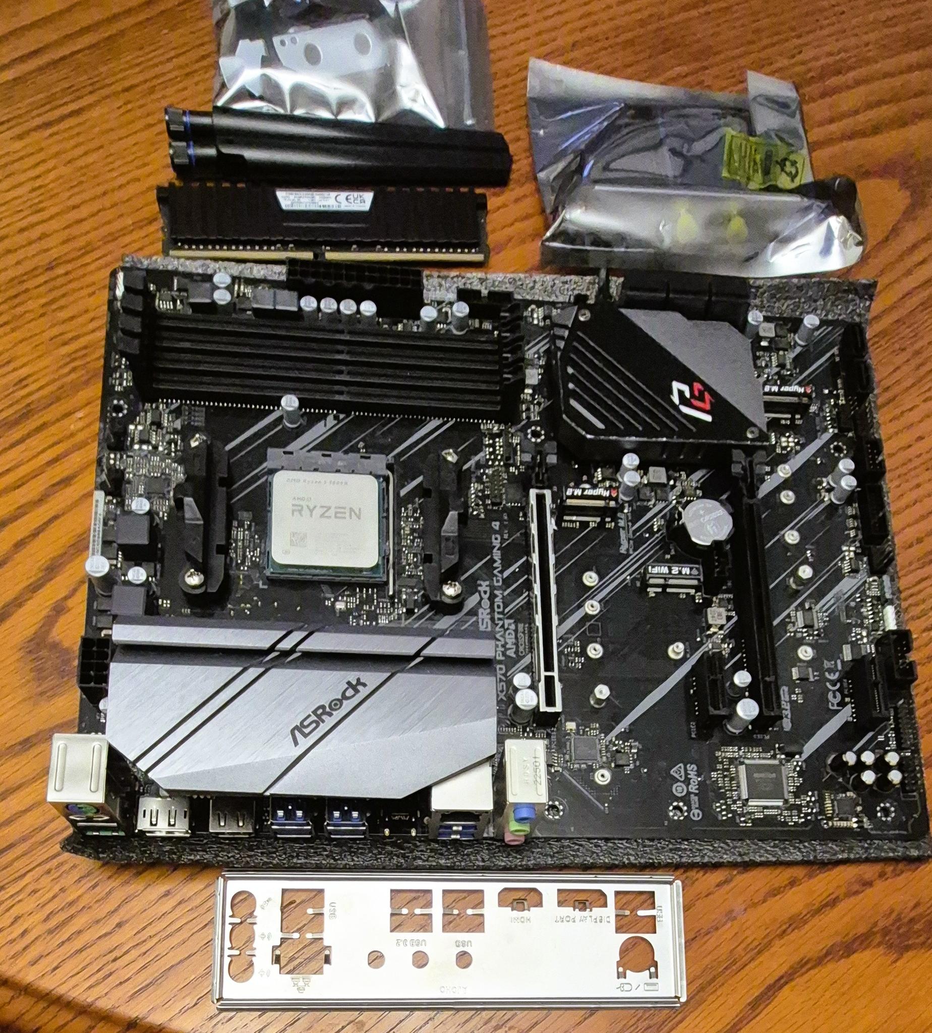 Combo ASRock X570 PHANTOM GAMING 4, AMD Ryzen 5 5600X AM4 CPU, 32GB RAM, AC1200 PCI-E WiFi Card