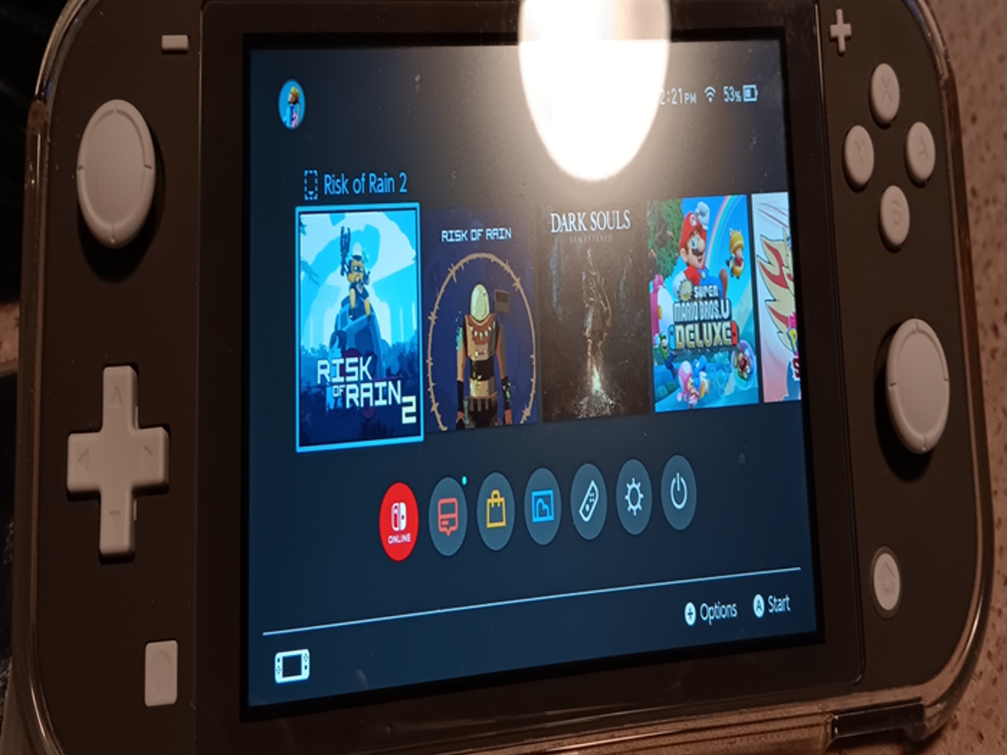 Switch Lite + 6 games and Accessories Used-Like new