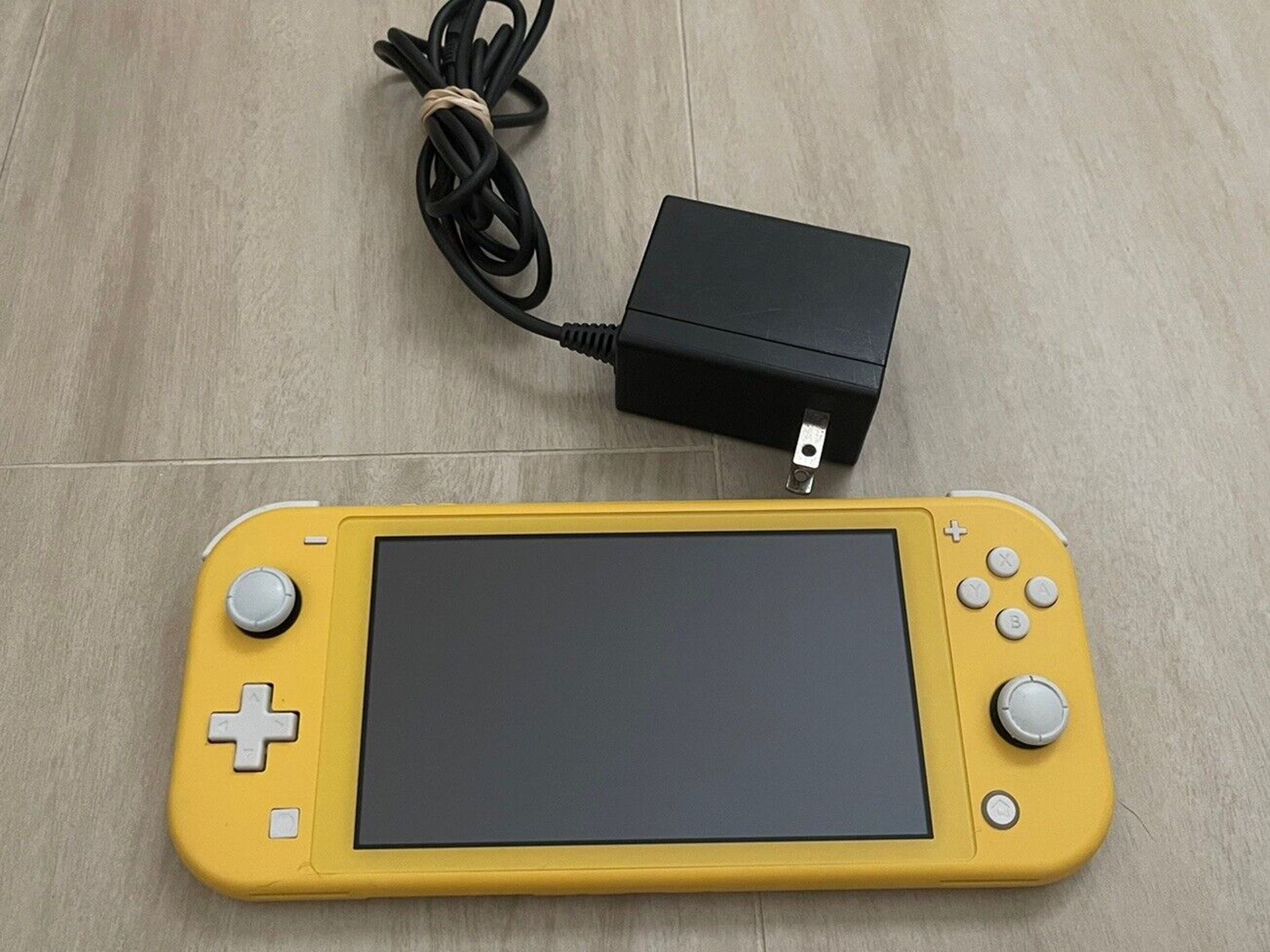 Nintendo Switch Lite Yellow Handheld Console With OEM Power Supply