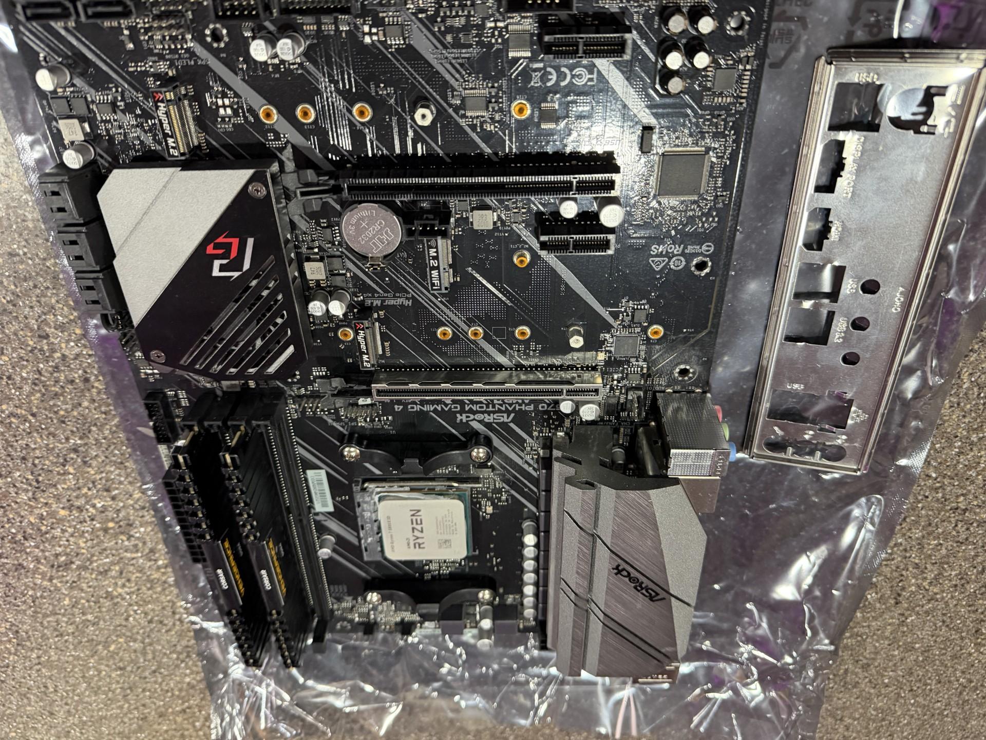 X570 Asrock Phantom Gaming 4 ATX motherboard with 5800X3D and 32gb of DDR4  3600 Ram
