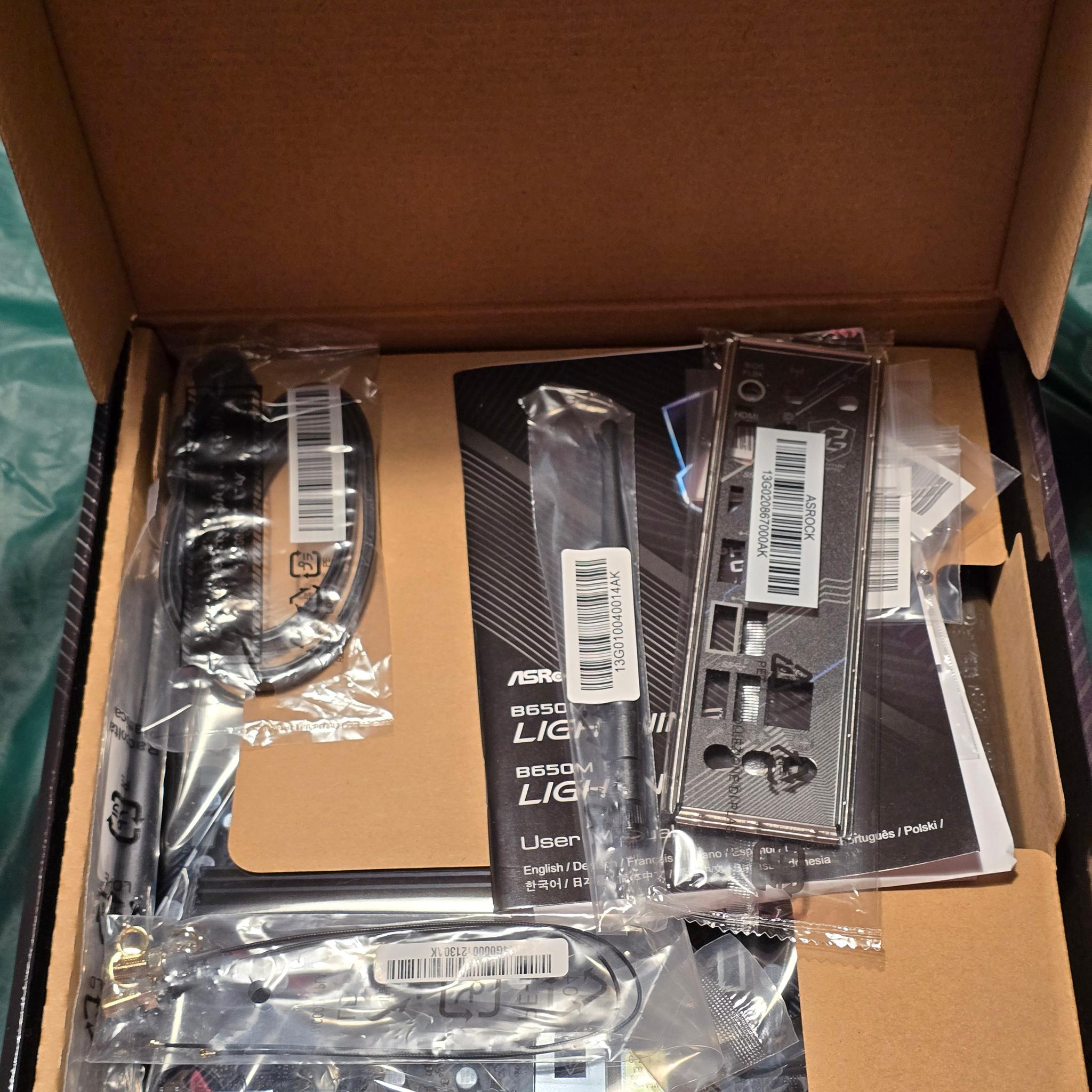 ASRock B650M PG Lightning WiFi 6E AMD Ryzen Socket AM5 SATA3 6.0 Gb/s ATX Motherboard M.2 RGB LED