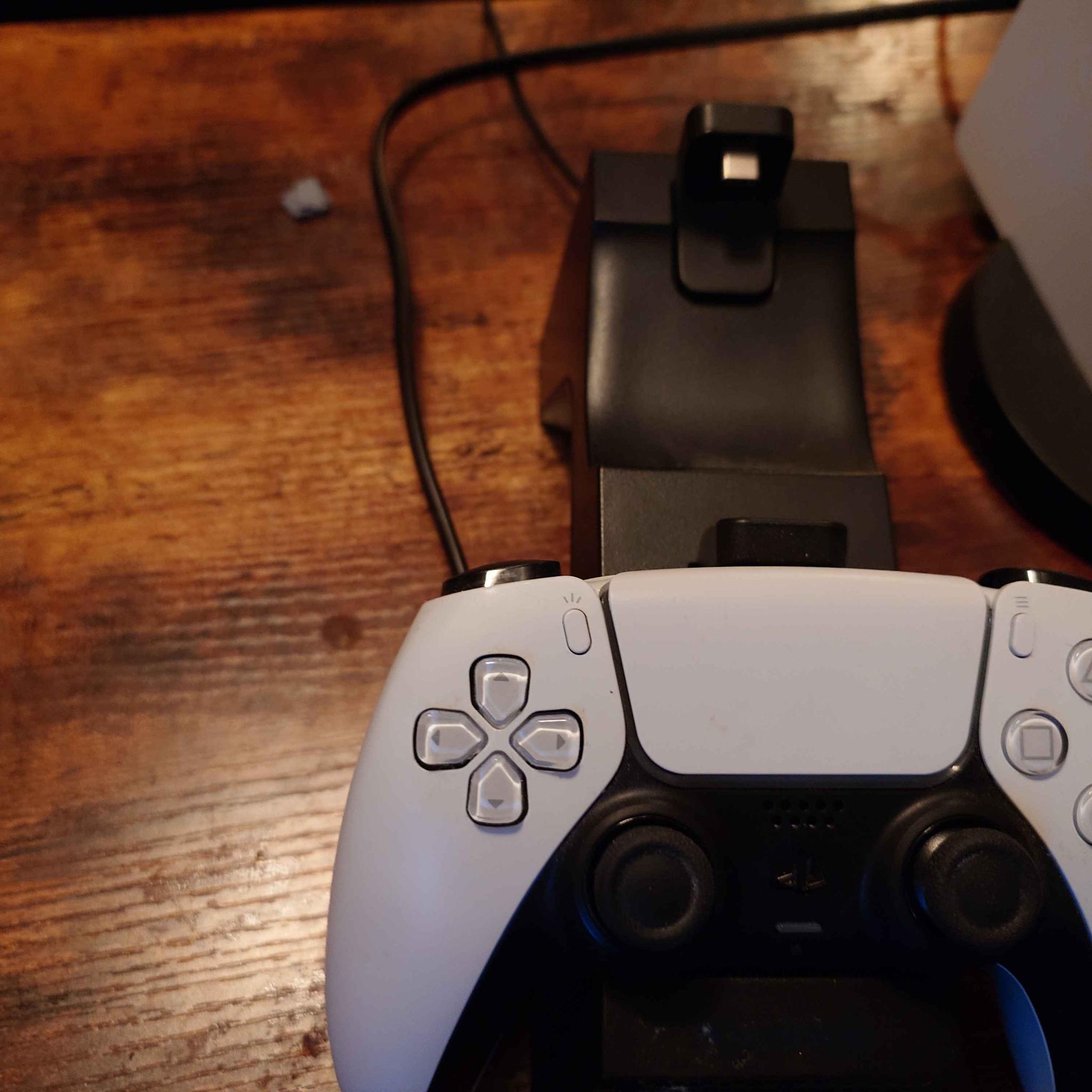 Playstation 5, with full cabling, controller, and controller charging dock
