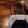 Playstation 5, with full cabling, controller, and controller charging dock