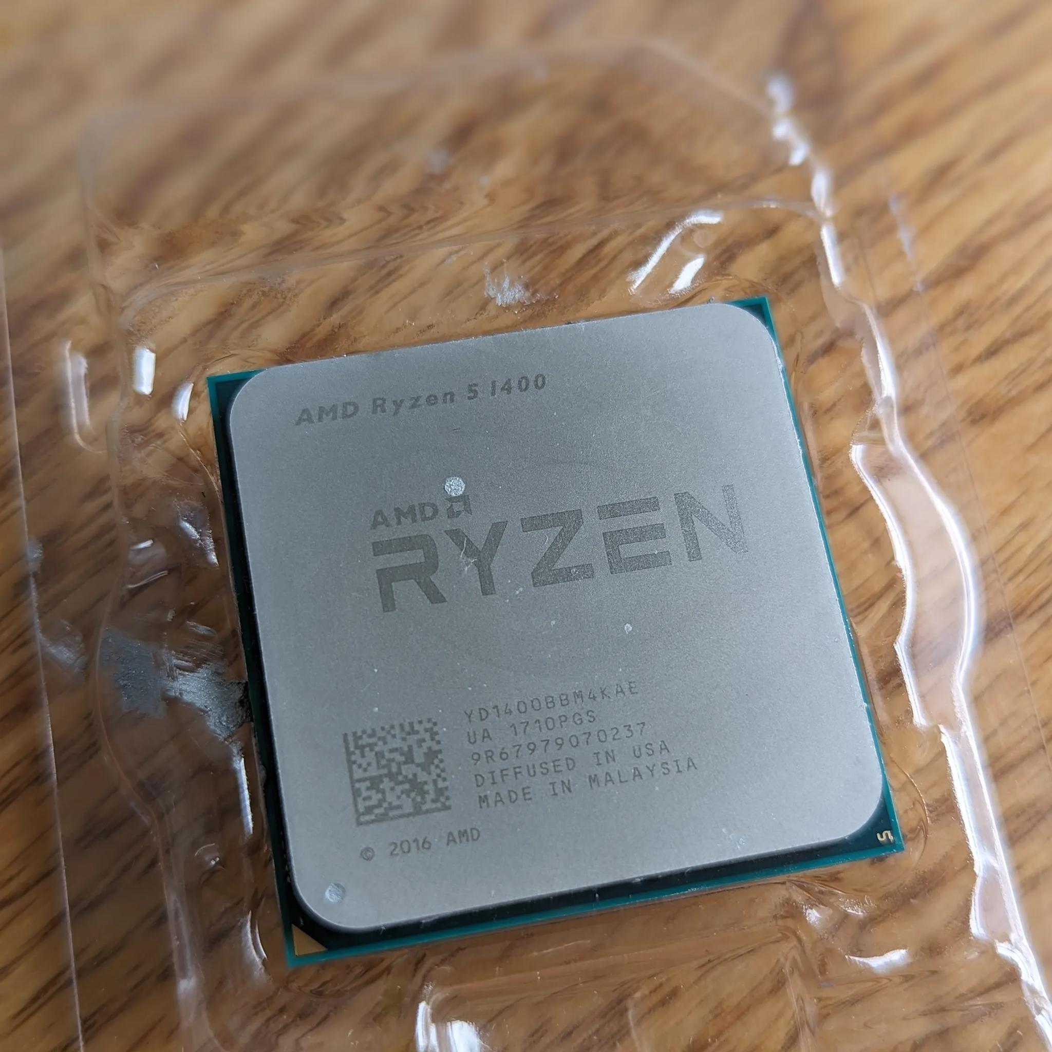 Ryzen 5 1400 , used with care. Comes with Original AMD Heatsink + fan. 