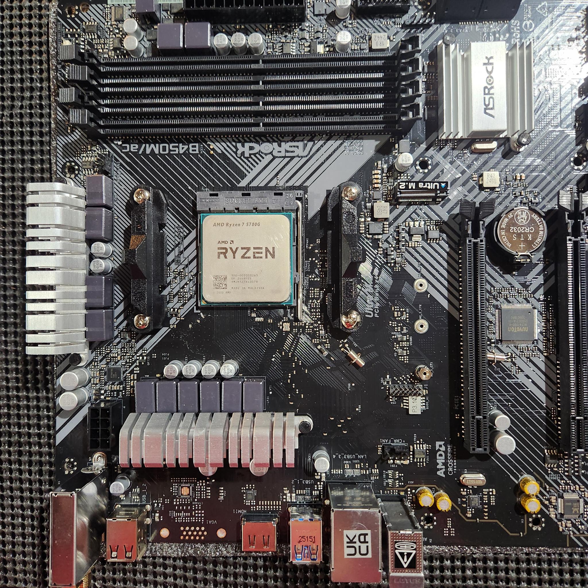 Asrock b450m ac/ r2.0 with ryzen 7 5700g cpu and 16gb ddr4 ram along with brand new cpu air cooler