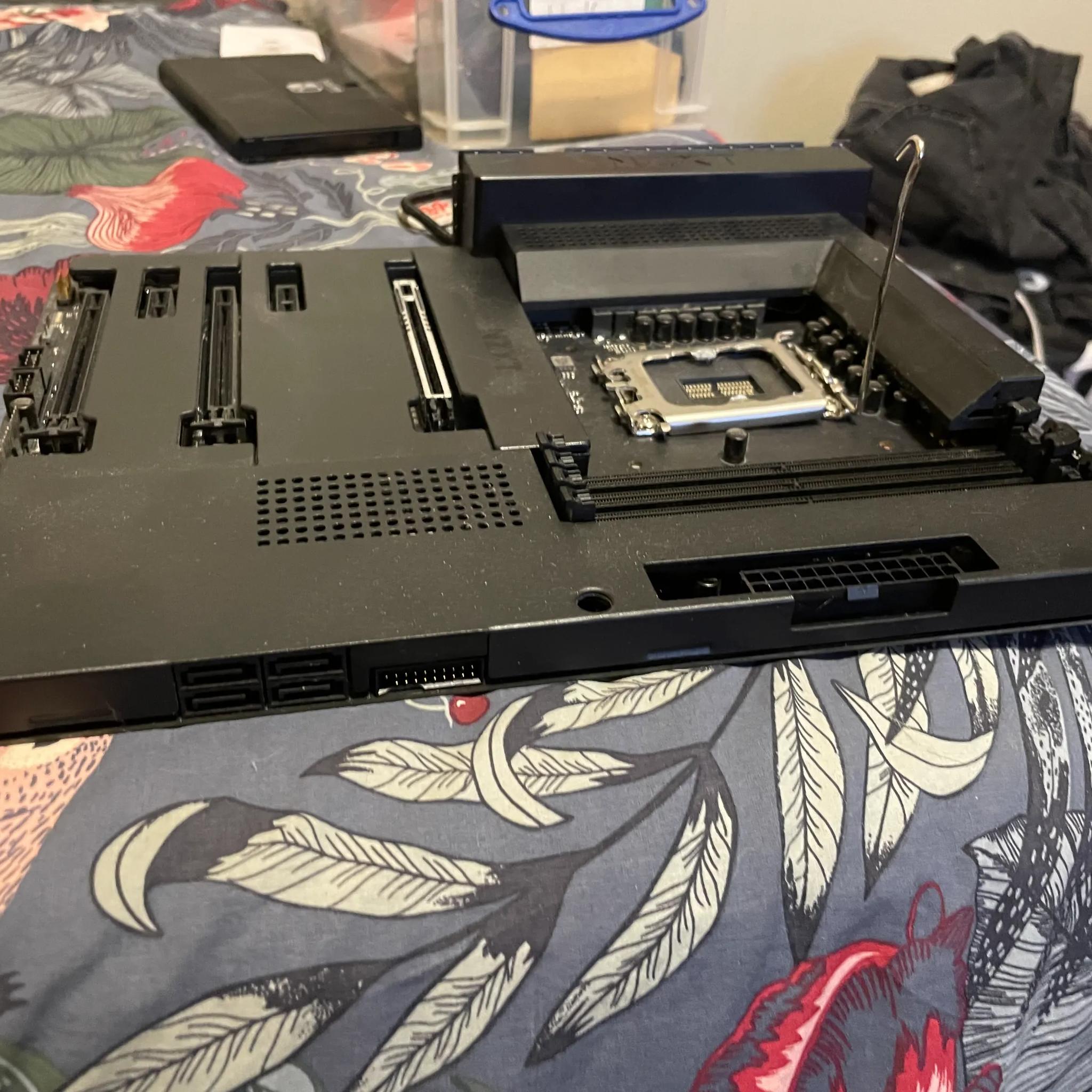 NZXT N7 Z790 Intel Motherboard Black (top PCLe tab is broken off)
