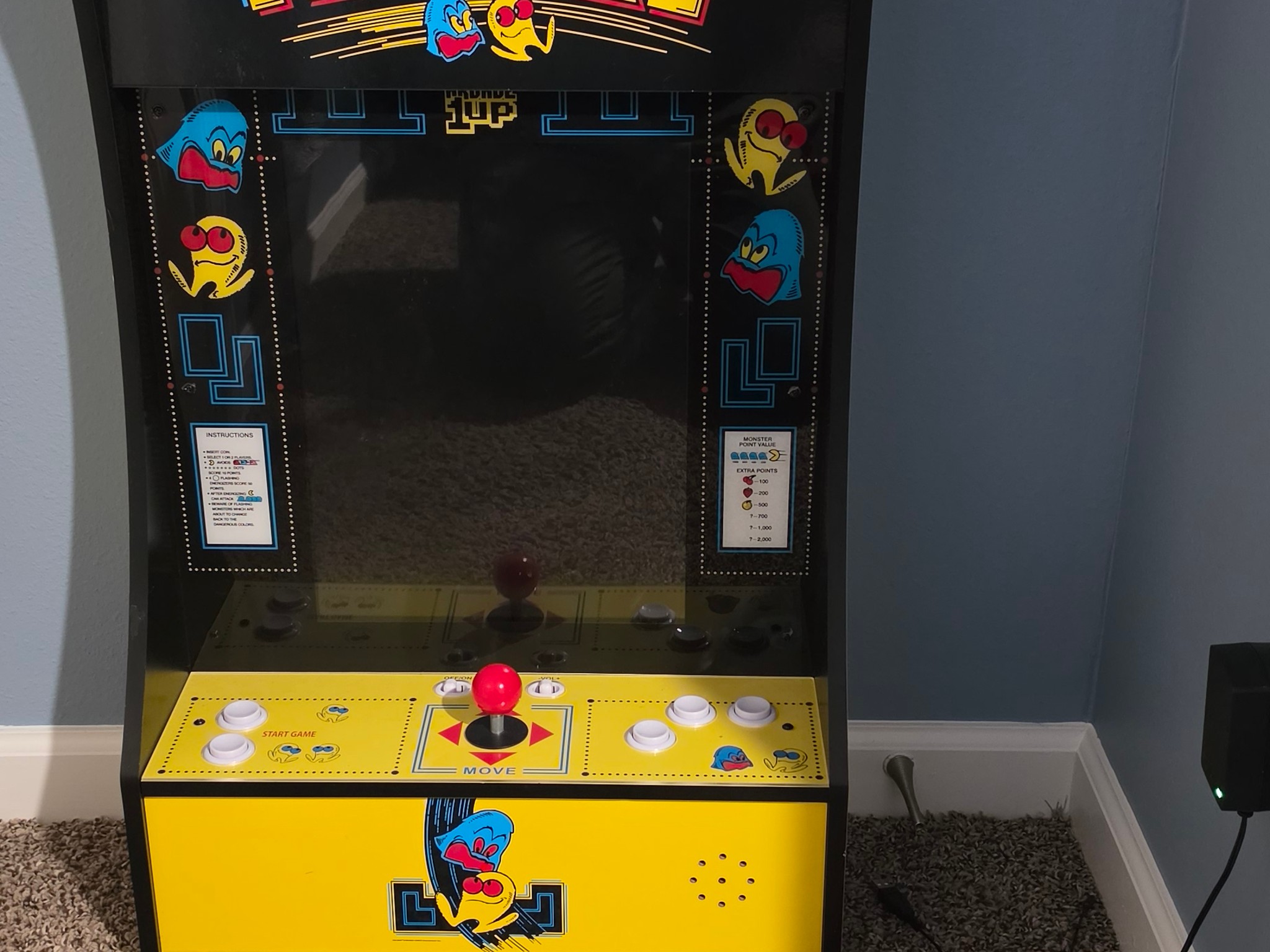 Small old school arcade style gaming system.