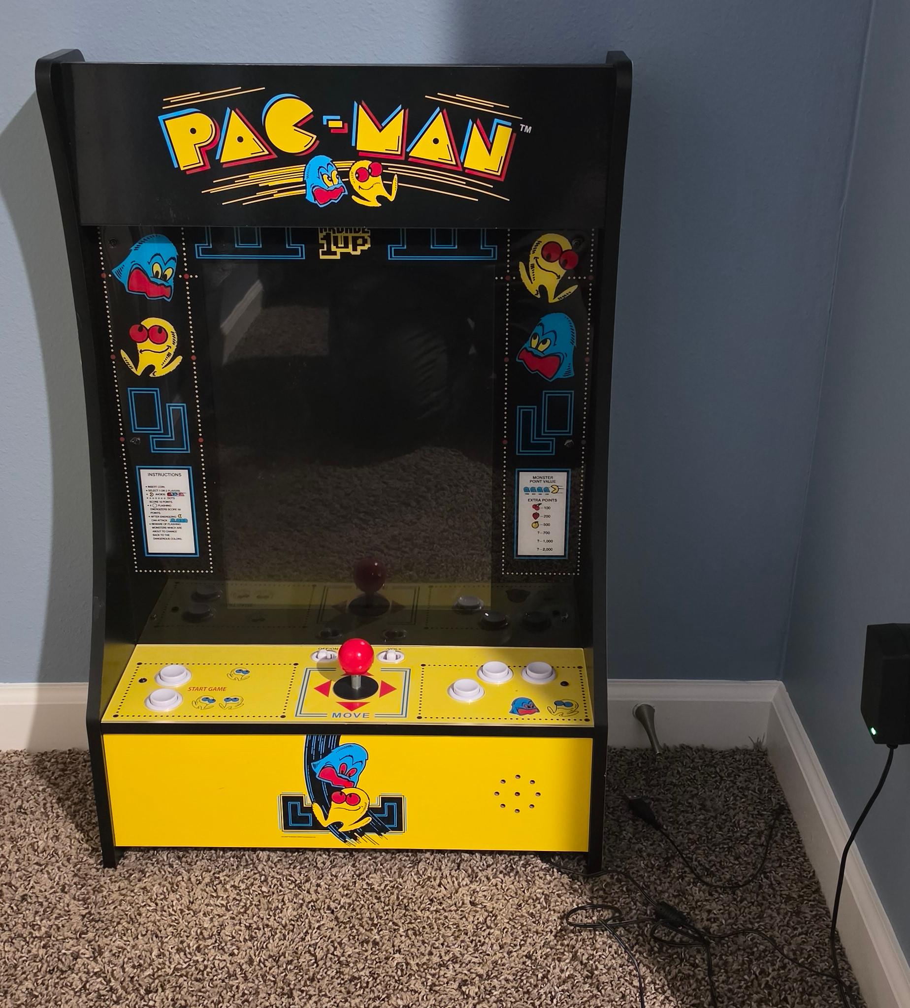Small old school arcade style gaming system.