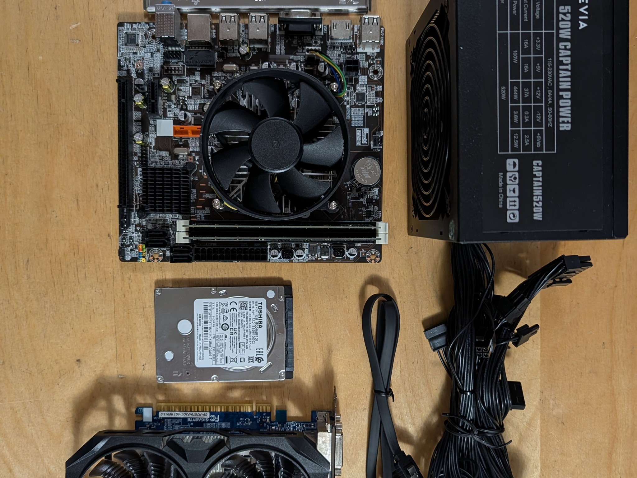 I5 3570 + H61 motherboard+ 16GB DDR3 + 1TB hard drive + GTX 750 ti + 520w power supply