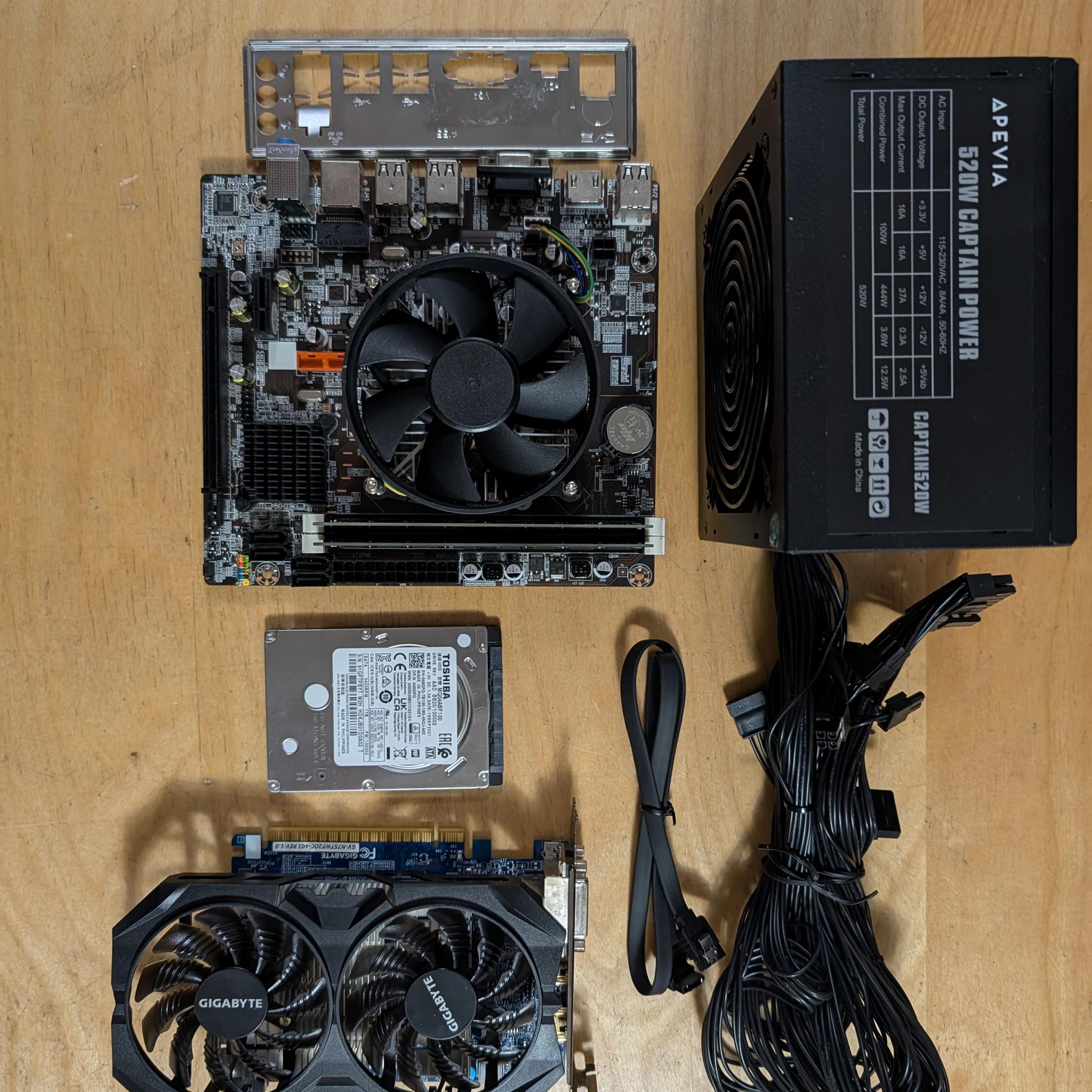 I5 3570 + H61 motherboard+ 16GB DDR3 + 1TB hard drive + GTX 750 ti + 520w power supply