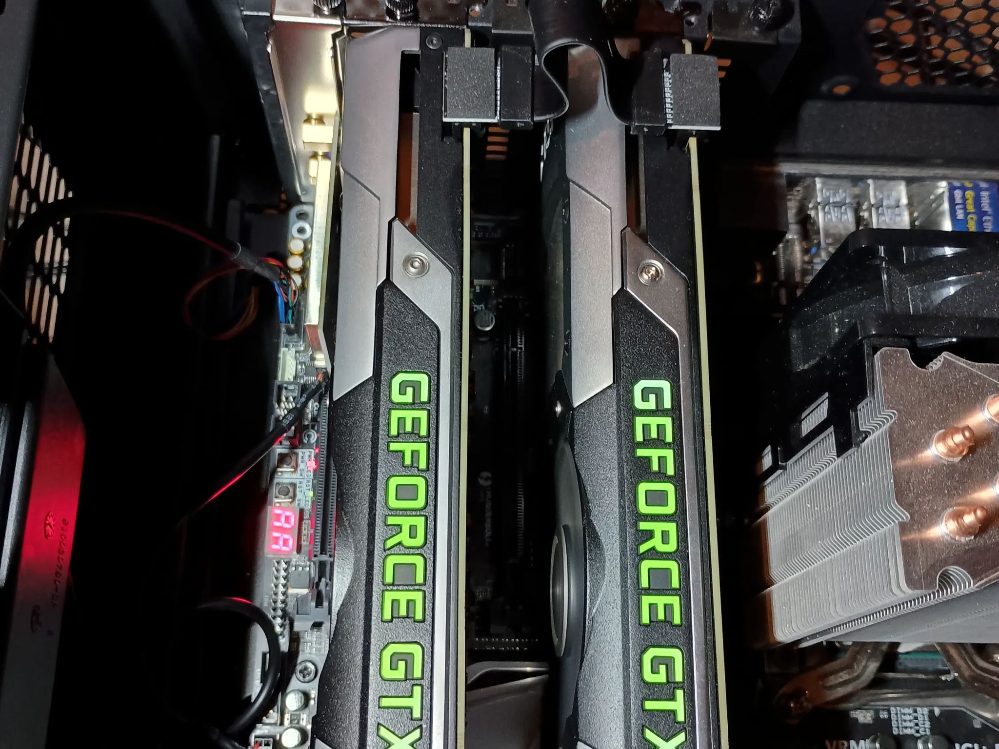 Two GTX 690 GPUs for Quad SLI (with SLI bridge). Tested, works well.