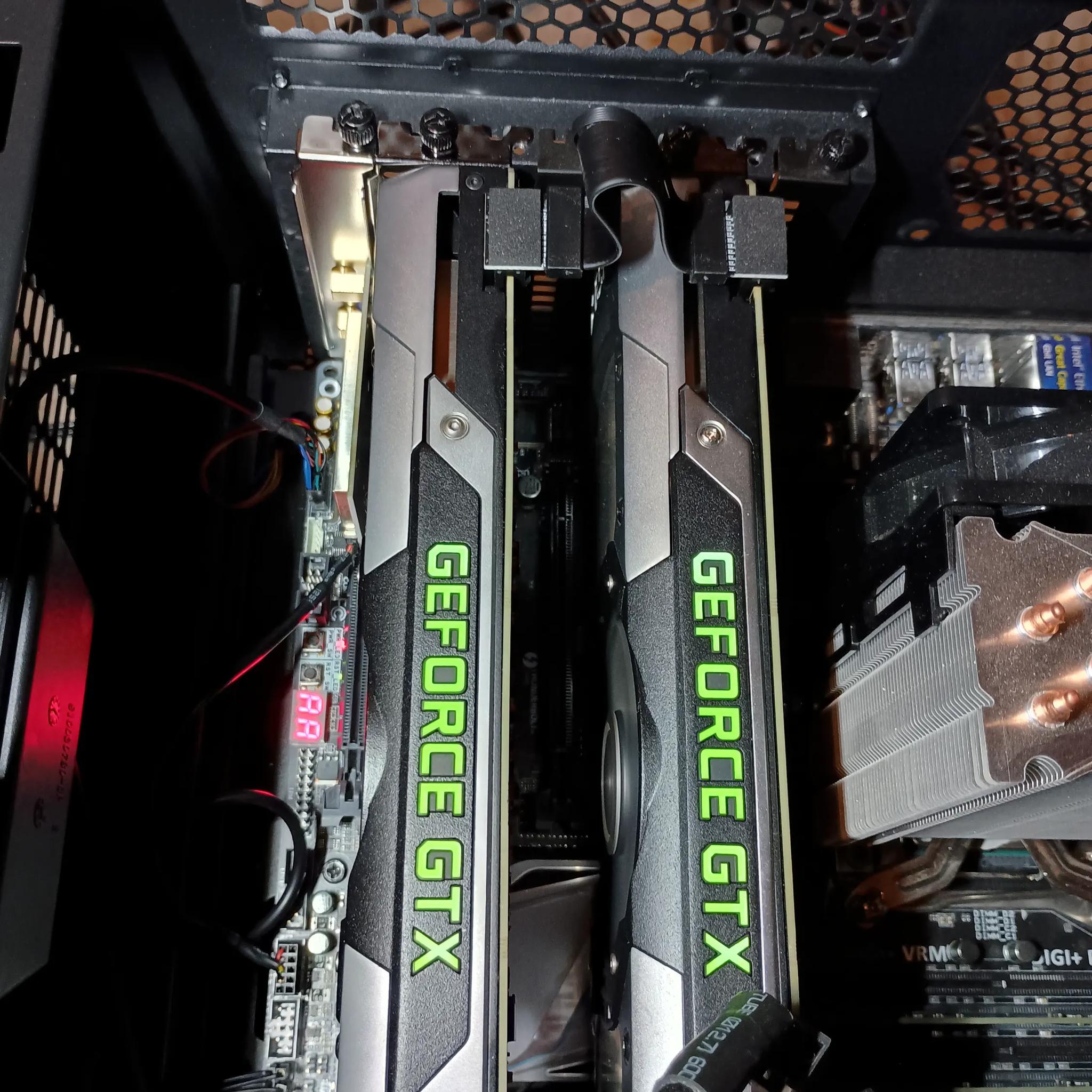 Two GTX 690 GPUs for Quad SLI (with SLI bridge). Tested, works well.