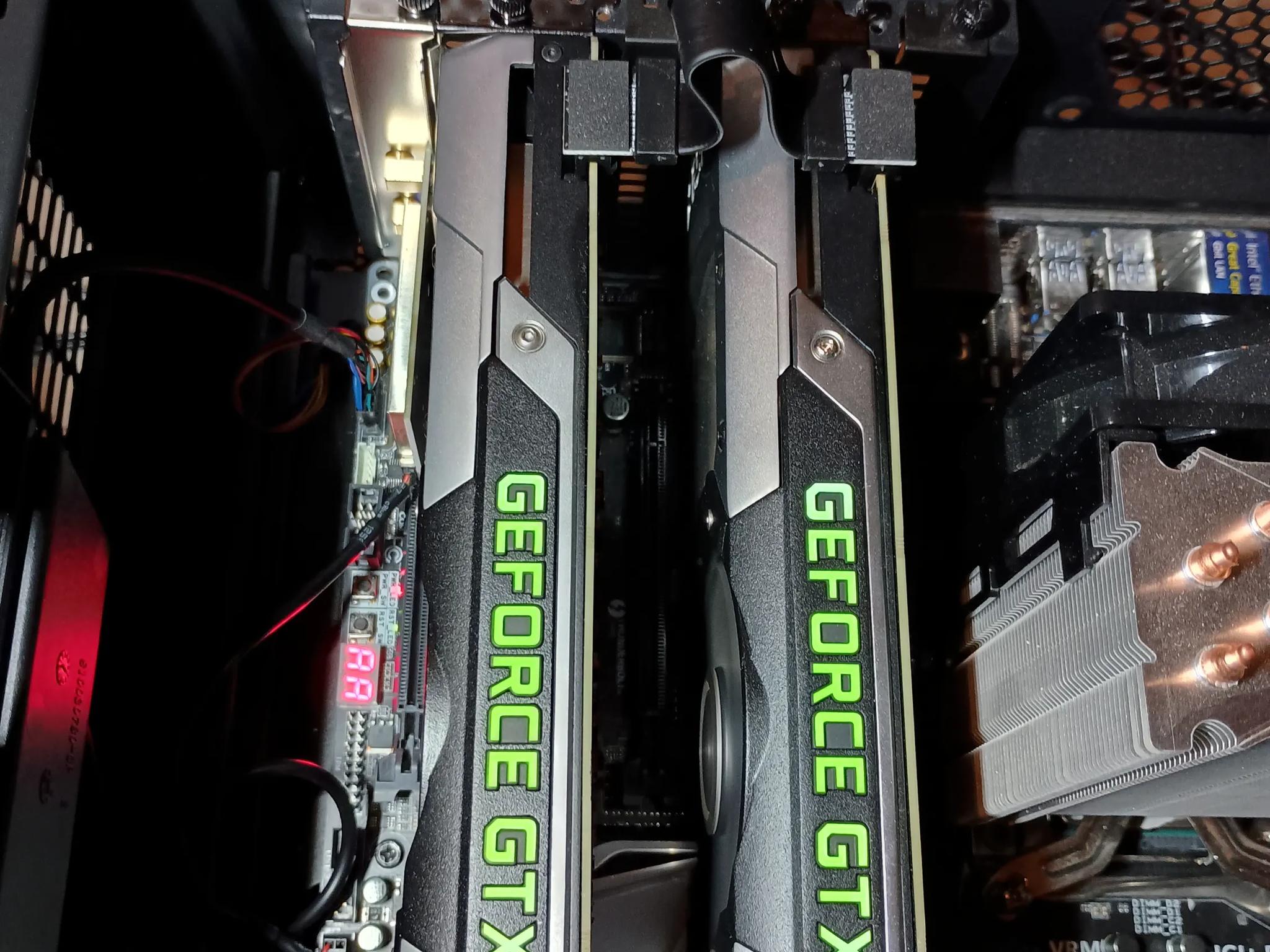 Two GTX 690 GPUs for Quad SLI (with SLI bridge). Tested, works well.