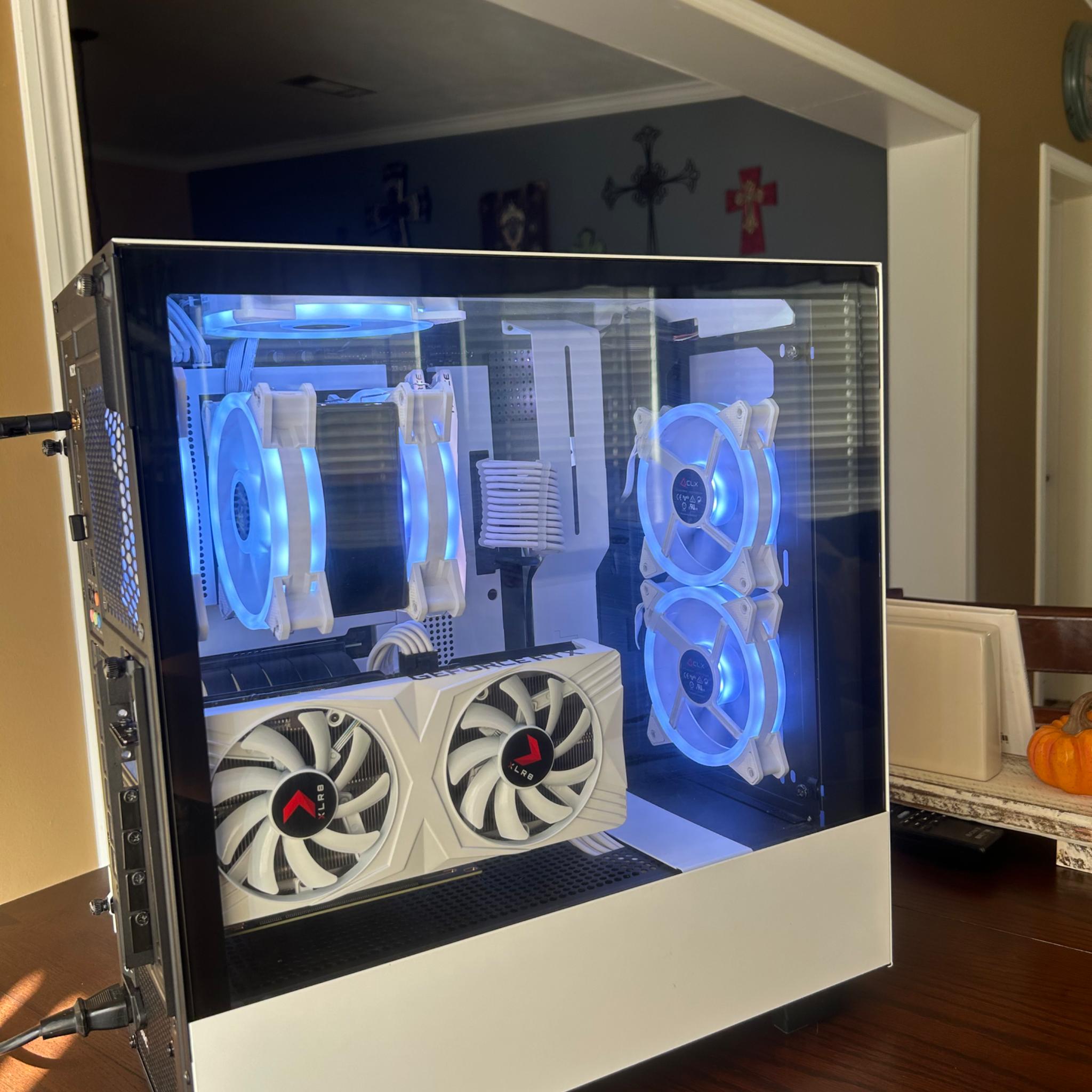 4060ti+12600k, 32GB Ram, 1TB NVME Ssd, vertical mounted, all white NZXT build.