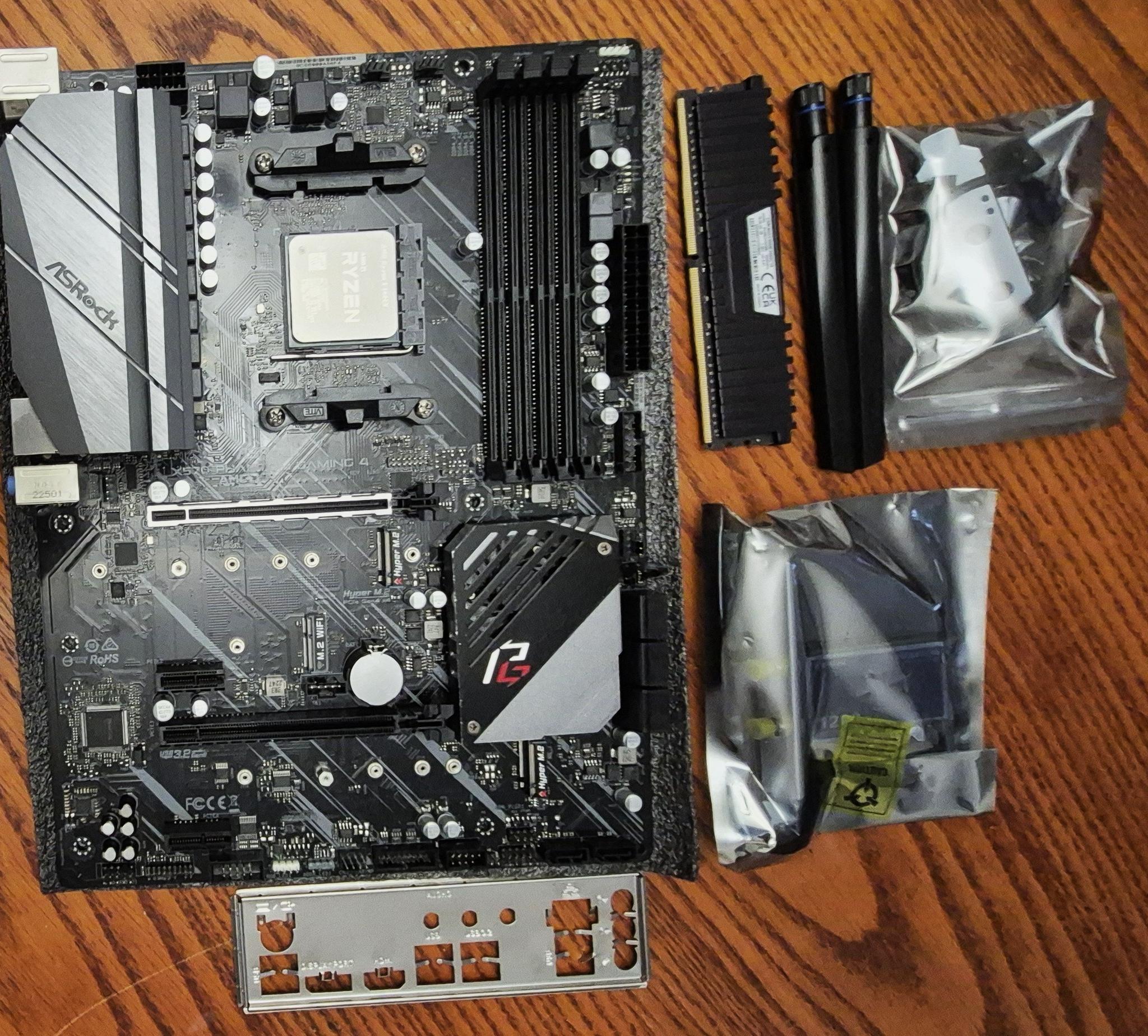 Combo ASRock X570 PHANTOM GAMING 4, AMD Ryzen 5 5600X AM4 CPU, 32GB RAM, AC1200 PCI-E WiFi Card