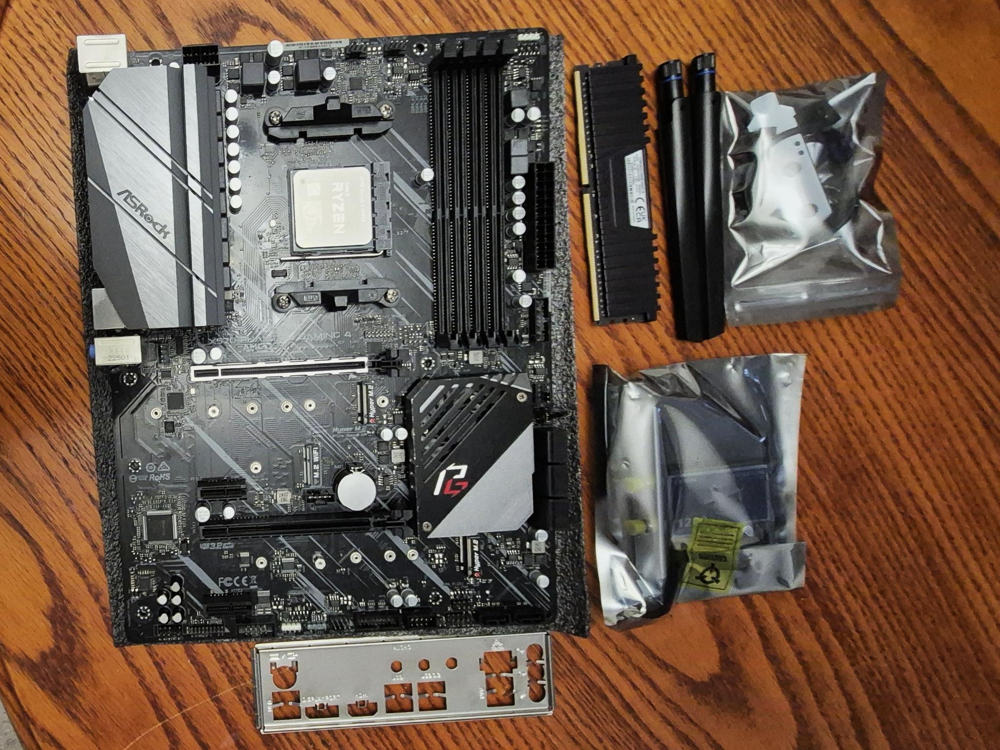Combo ASRock X570 PHANTOM GAMING 4, AMD Ryzen 5 5600X AM4 CPU, 32GB RAM, AC1200 PCI-E WiFi Card
