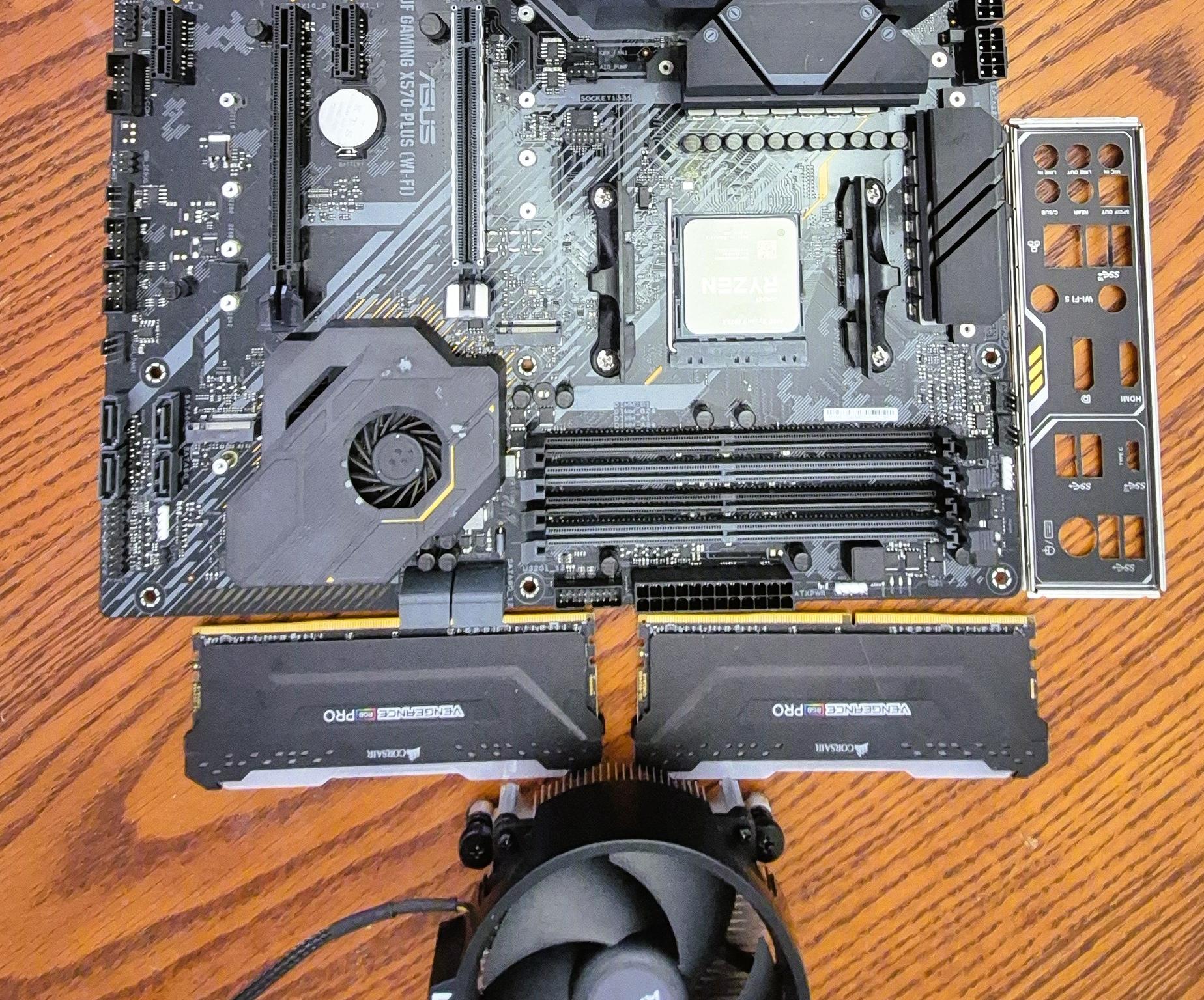 Pre-owned AMD Ryzen 9 5950X CPU, ASUS TUF Gaming X570 Plus (WI-FI) AXT M-board  and AMD Wrath Cooler