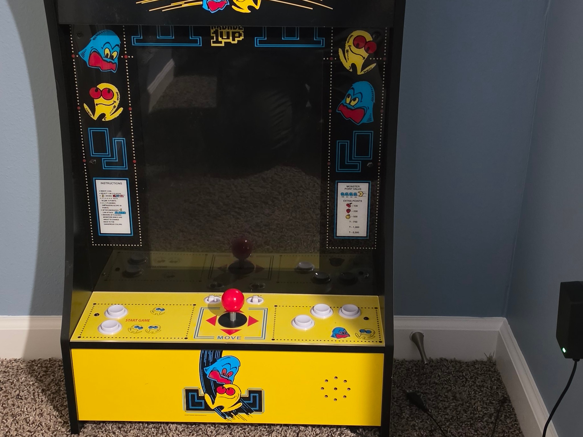 Small old school arcade style gaming system.