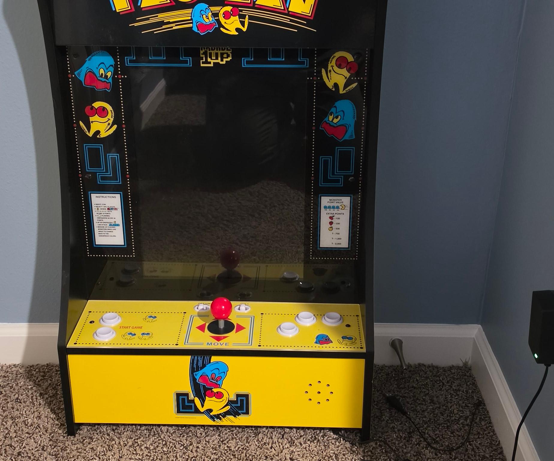 Small old school arcade style gaming system.