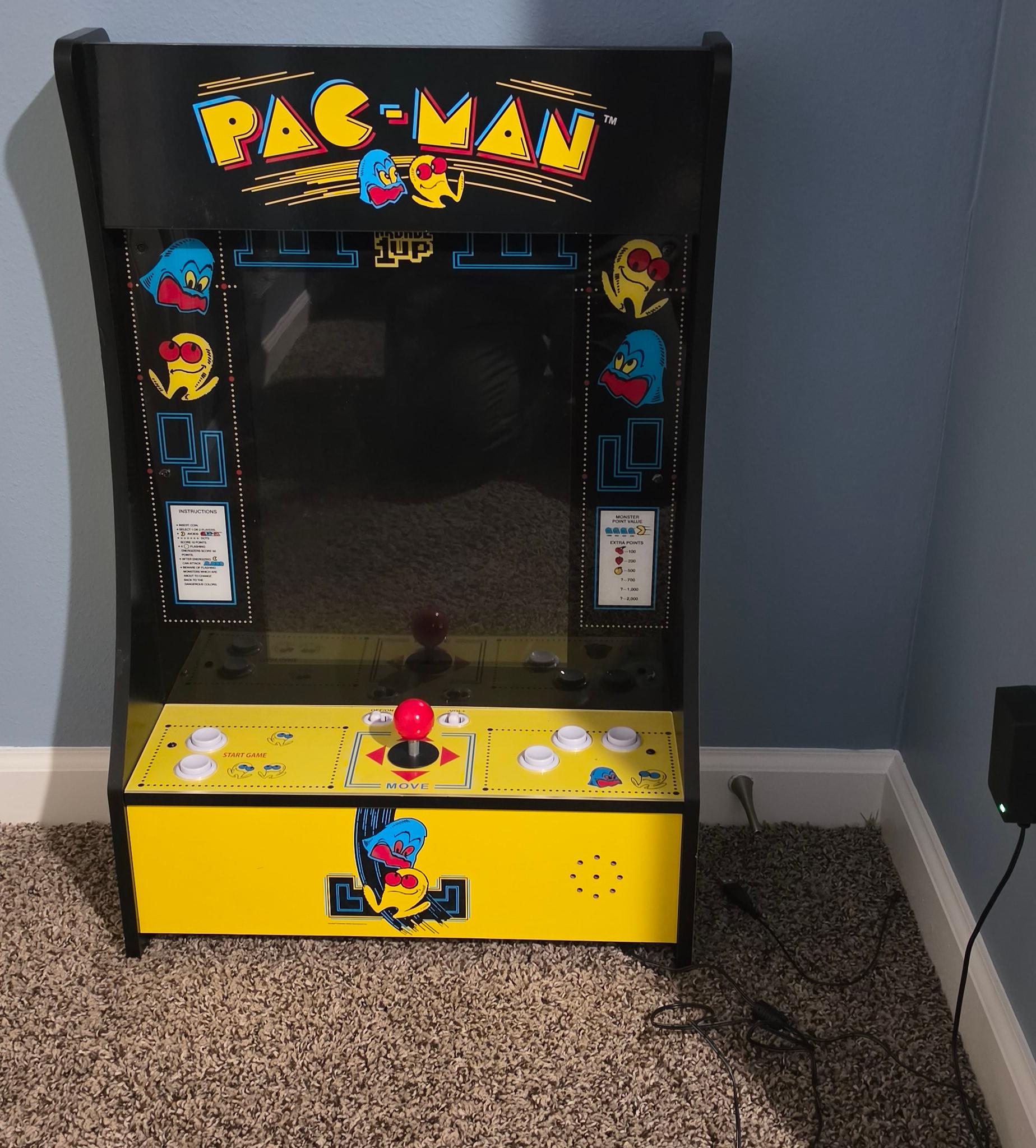 Small old school arcade style gaming system.