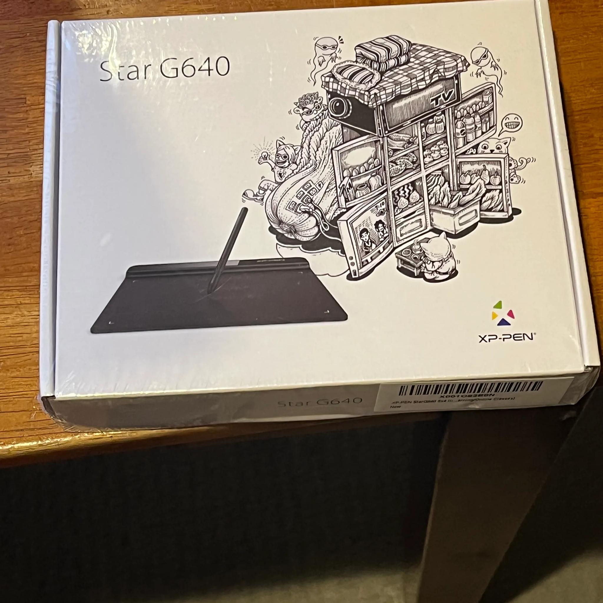 drawing pen/ tablet? Idk much about it, box has some dents but factory seal.