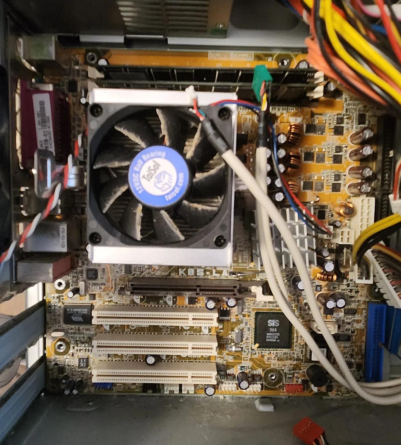 Prehistoric amd athlon 64 asus motherboard ram combo with a nvidia fx 5500 and a miscellaneous card