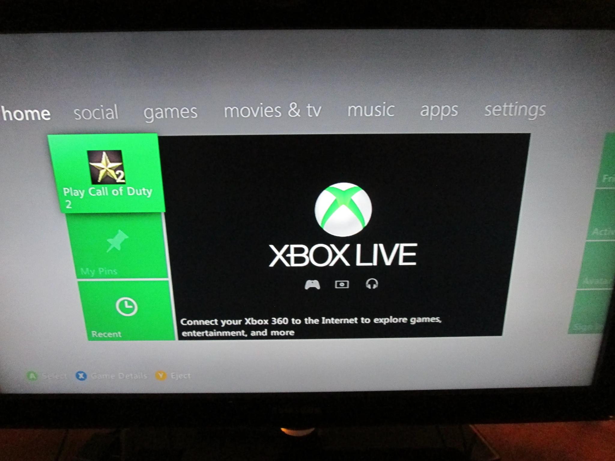 Xbox 360 Slim With White Controller, 4gb Internal Storage And 120gb Hard Drive