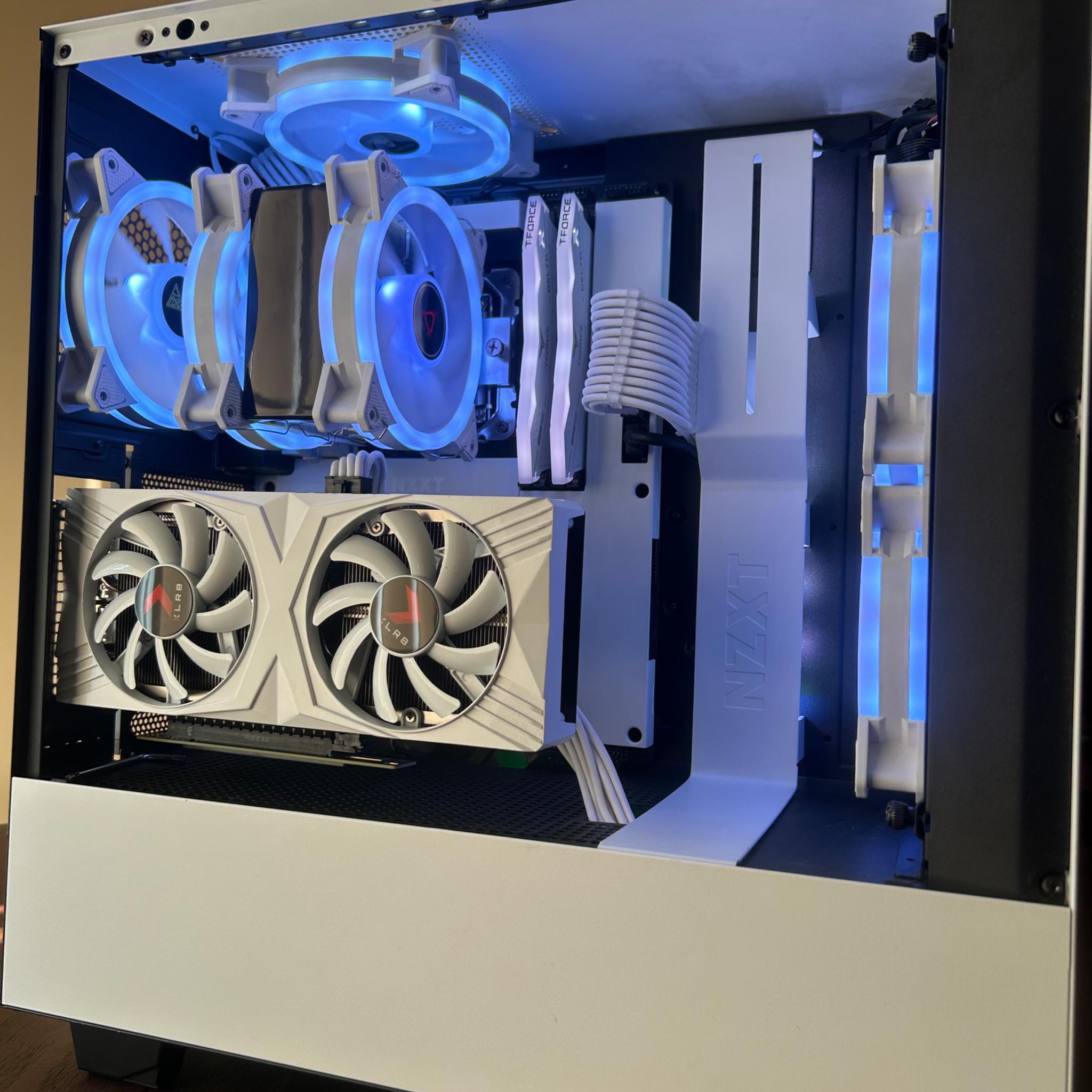 4060ti+12600k, 32GB Ram, 1TB NVME Ssd, vertical mounted, all white NZXT build.