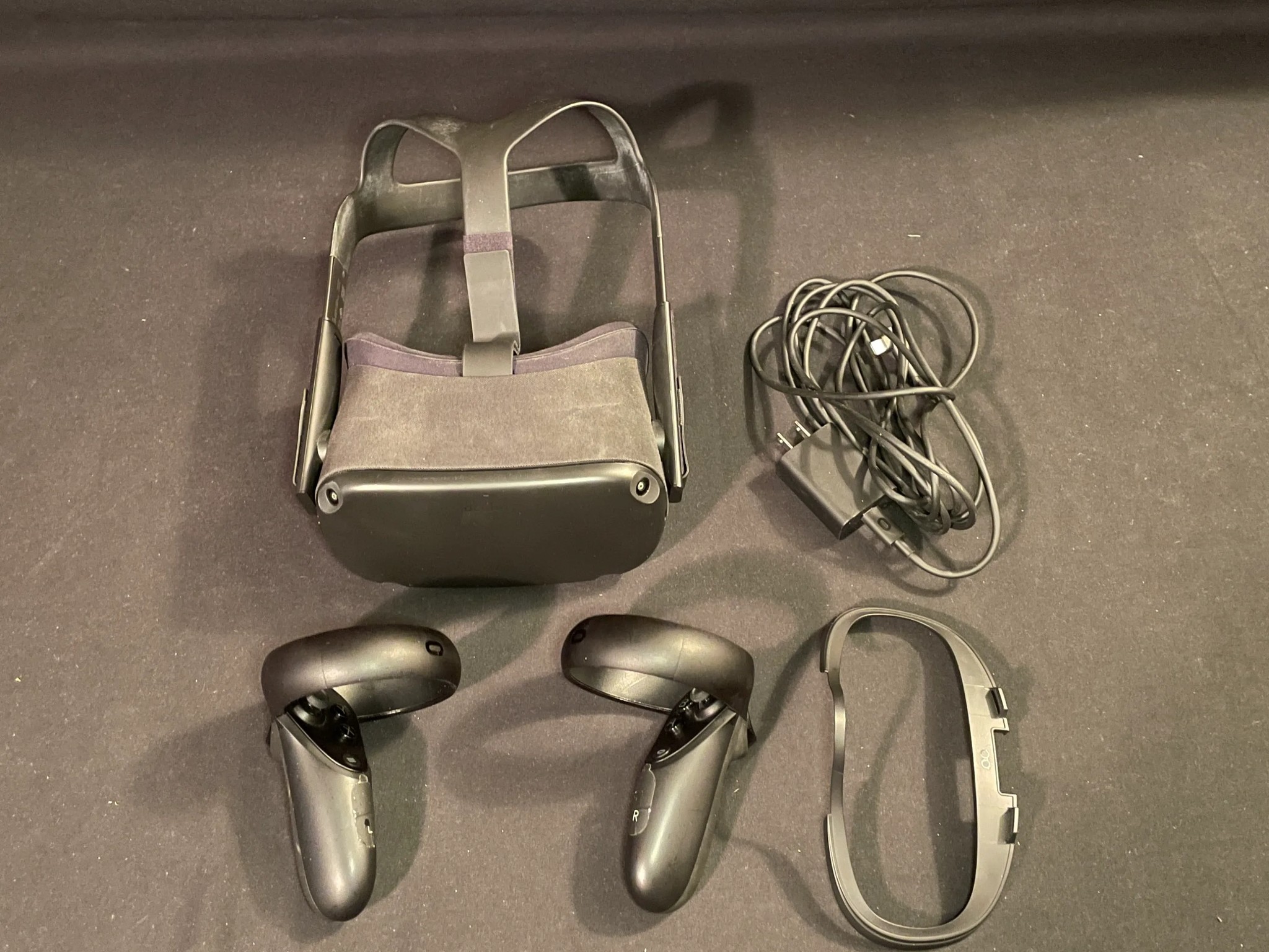 Meta Oculus Quest With Games And Accessories.