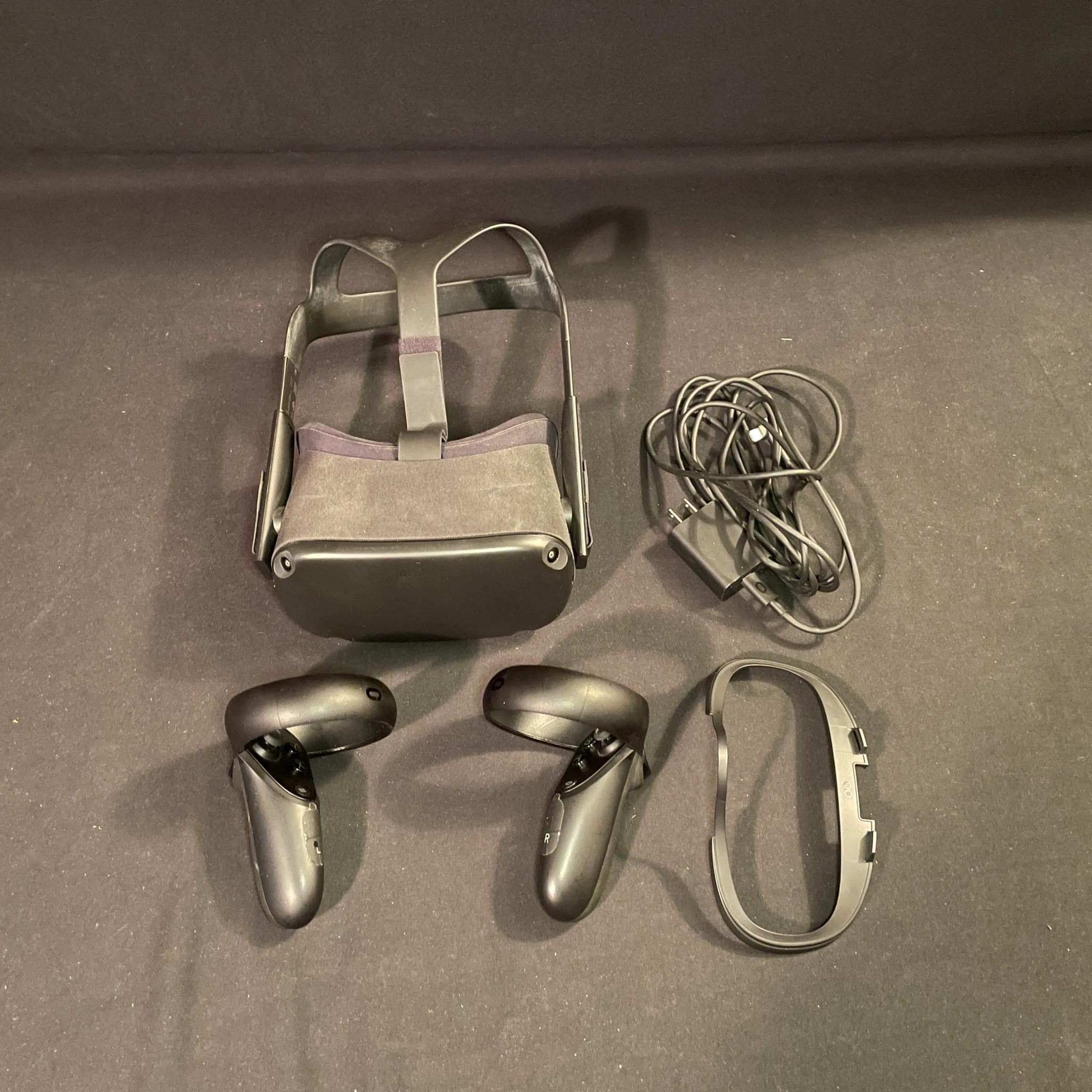 Meta Oculus Quest With Games And Accessories.